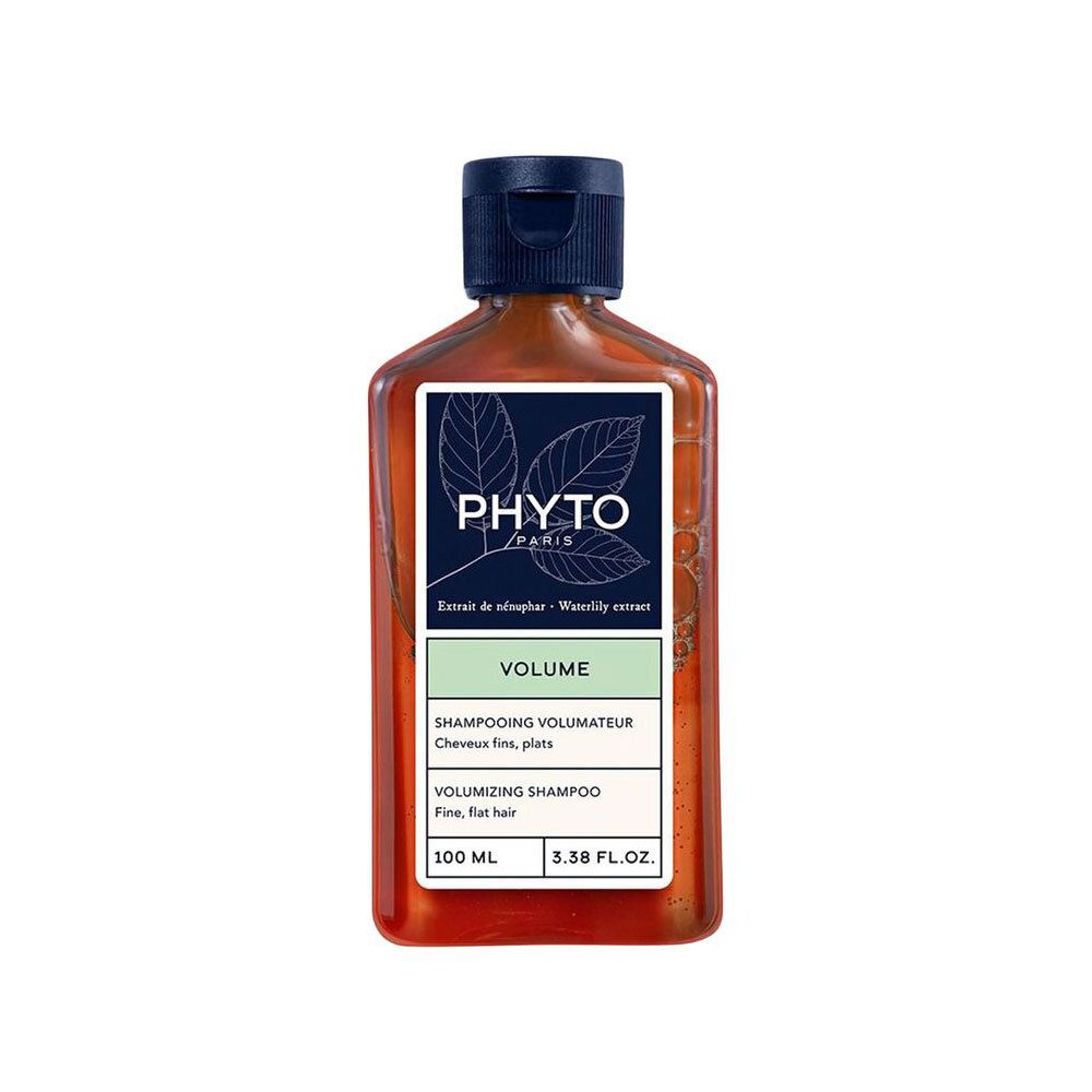 Bruine shampoo fles met blauwe dop. Label met "PHYTO PARIS" en "VOLUME". Tekst in het Frans en Engels.