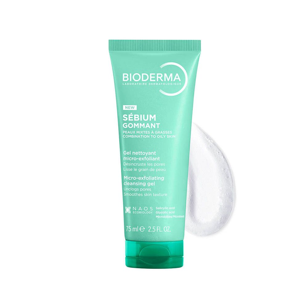 Turquoise tube met witte tekst. Opschrift: Bioderma, Sébium Gommant, Gel nettoyant micro-exfoliant. 75 ml. Witte crème ernaast.