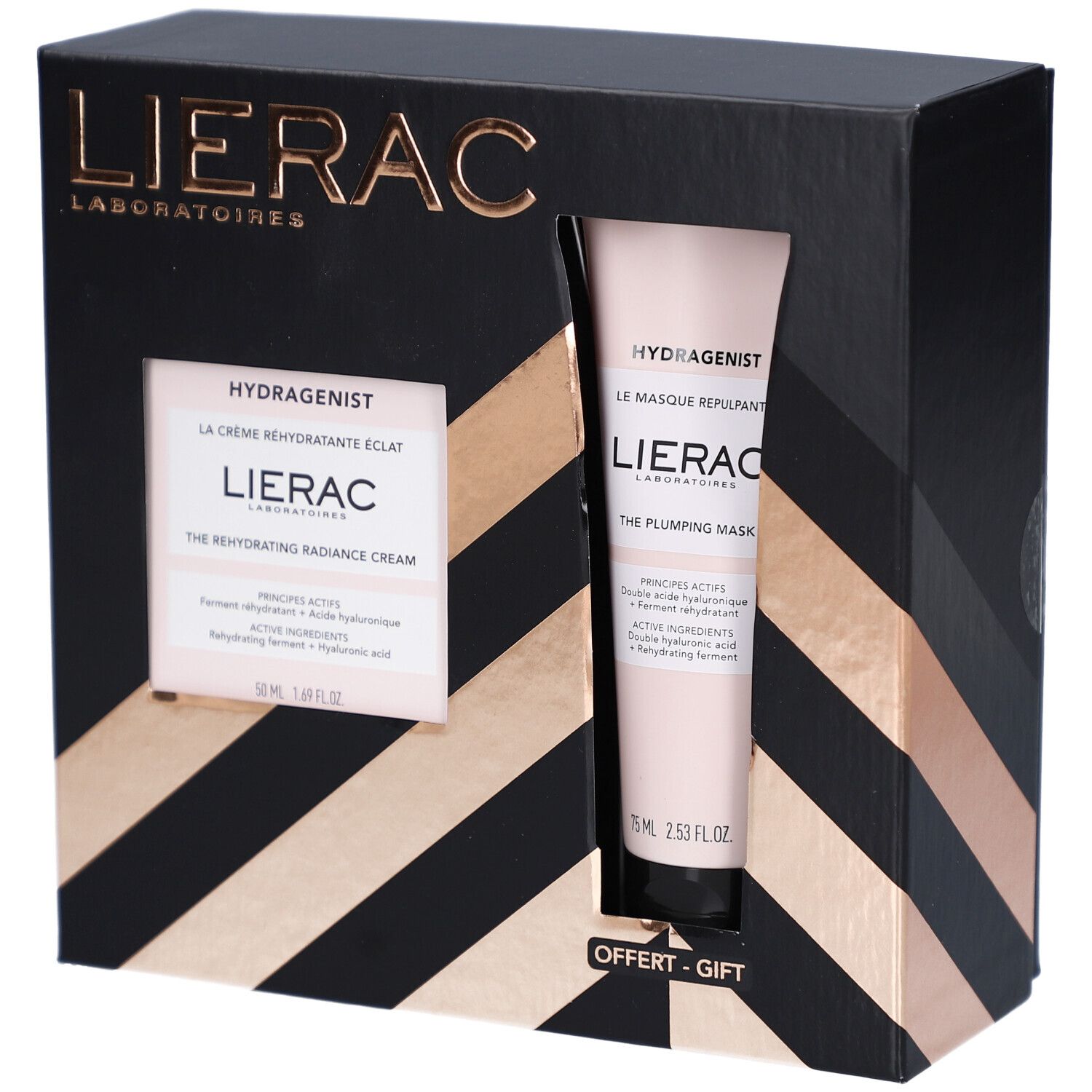 Coffret cadeau noir avec fenêtre. Contient une crème et un masque. Accents dorés. Inscription "OFFERT - GIFT".