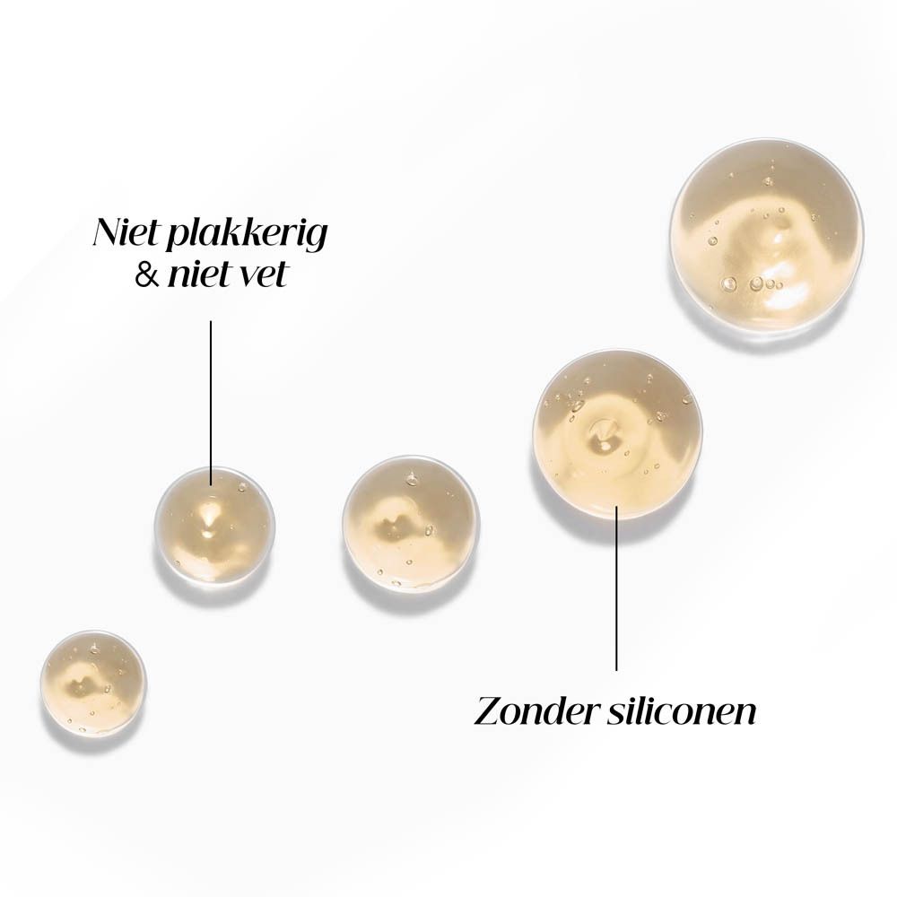 Druppels serum. Gelige vloeistof. Tekst: Niet plakkerig & niet vet, Zonder siliconen.