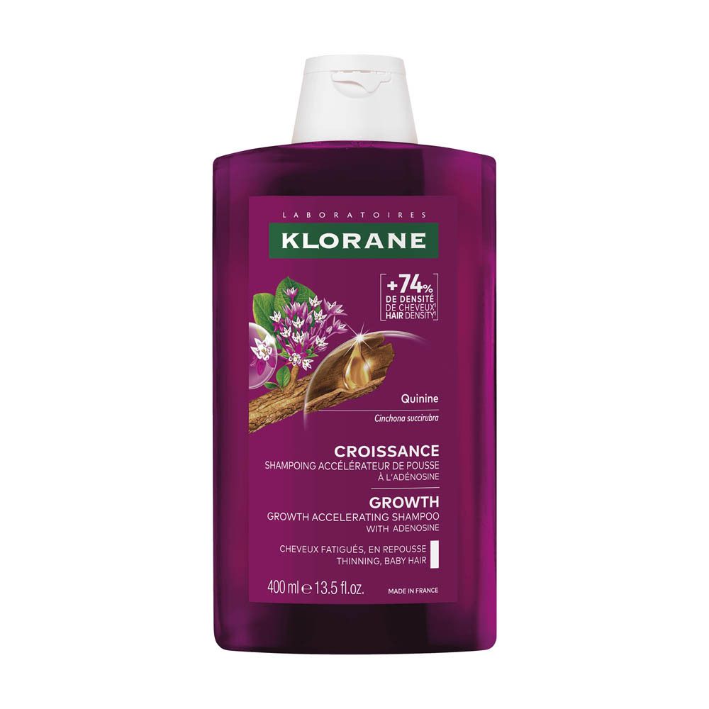 Flacon de shampooing Klorane. Liquide violet, bouchon blanc. Inscription: Croissance, Growth, 400 ml.