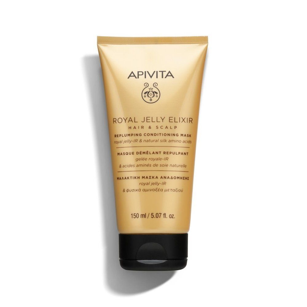 Tube beige avec bouchon noir. Inscription: Apivita, Royal Jelly Elixir, Masque Démêlant Repulpant. 150 ml.