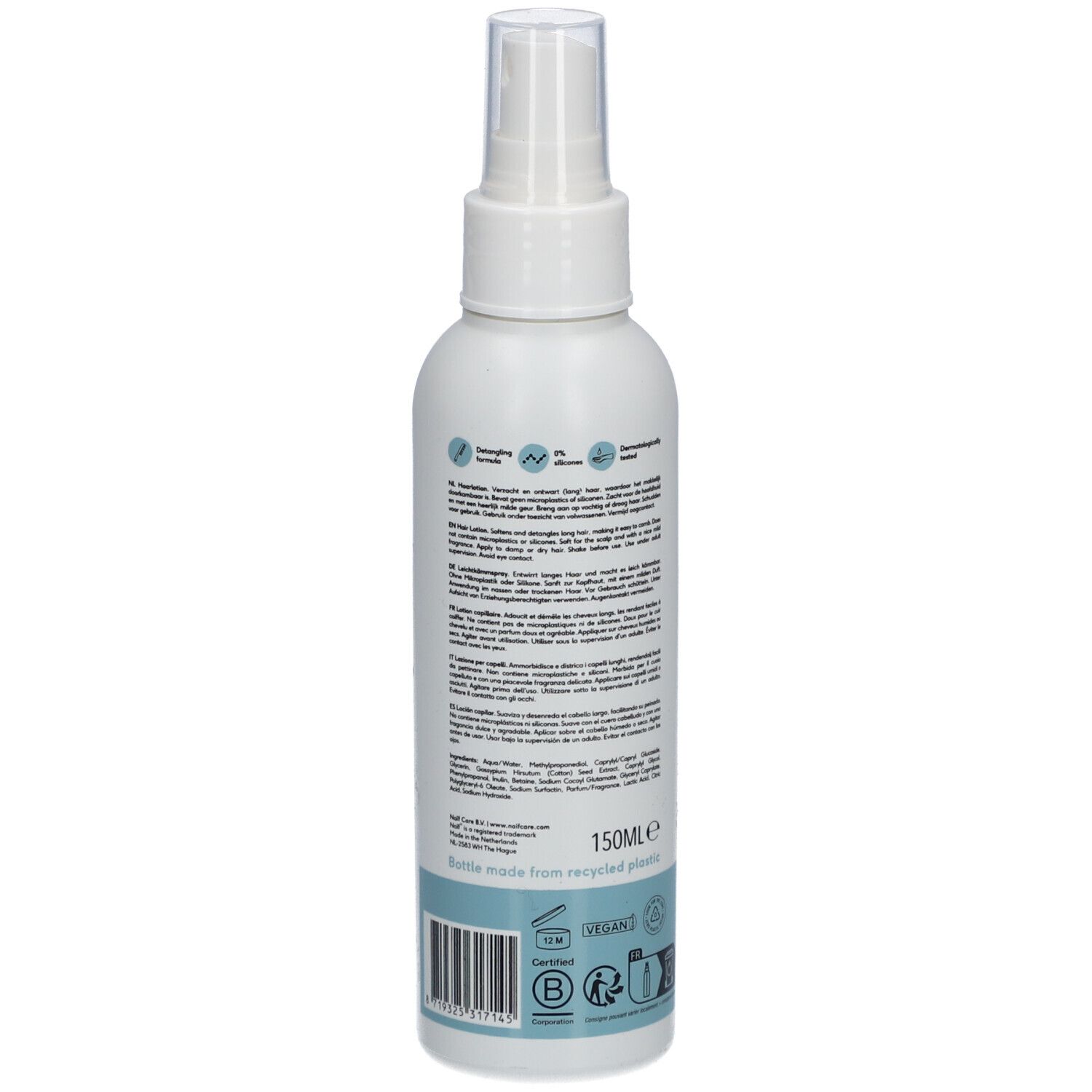 Witte fles met verstuiver. Opschrift: Naïf, Hair Lotion. Tekst op achterkant. 150ml. Voor baby's en kinderen.