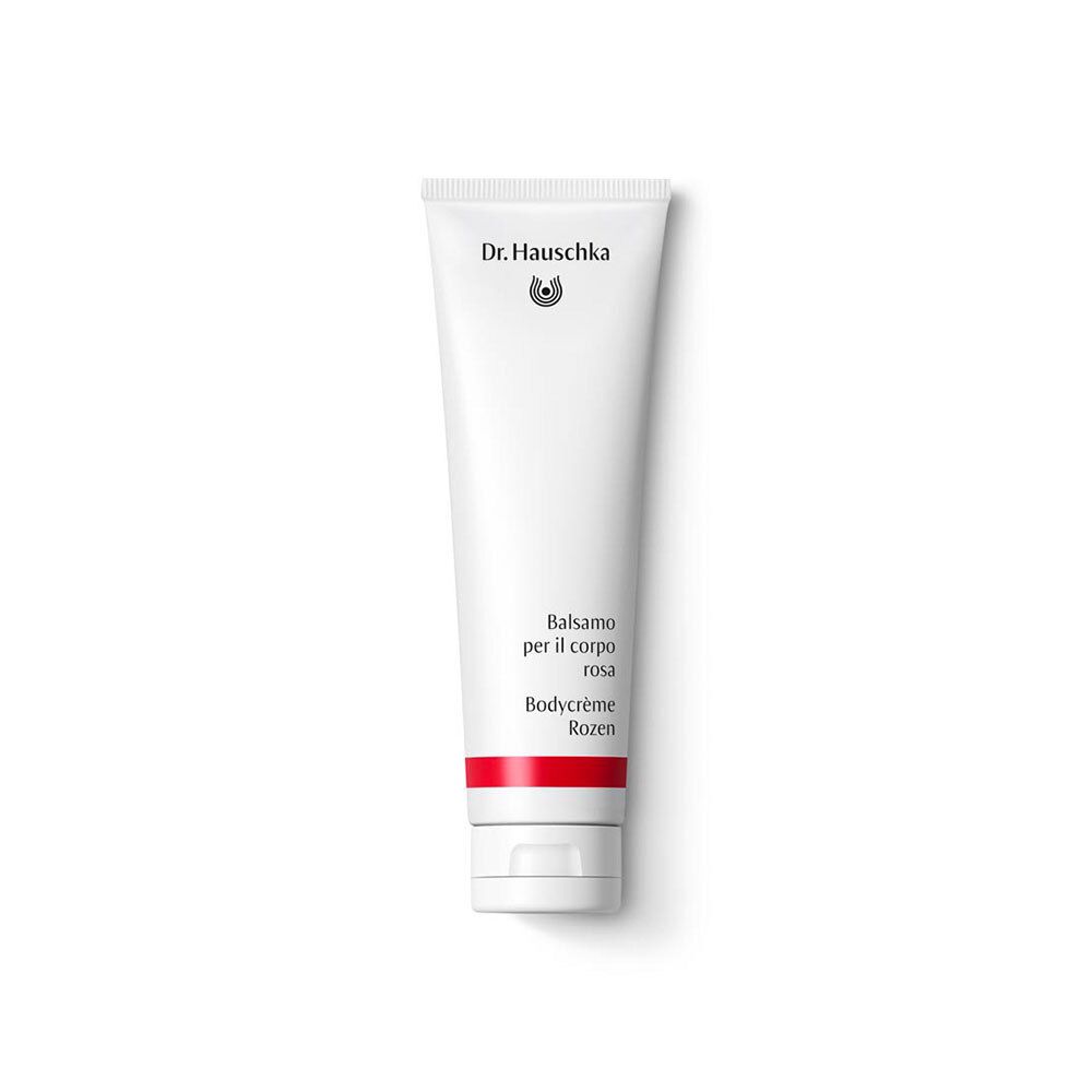 Witte tube met rode streep. Opschrift: Dr. Hauschka, Balsamo per il corpo rosa, Bodycrème Rozen.