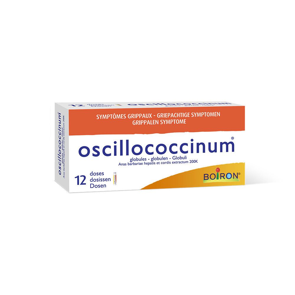 Doosje Oscillococcinum. Oranje-witte verpakking met productnaam en logo. 12 doses.