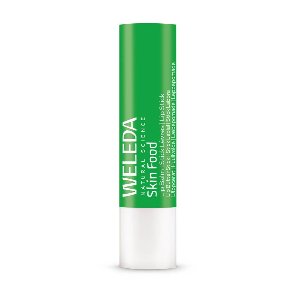 Stick à lèvres vert avec extrémité blanche. Inscriptions : Weleda, Skin Food, Lip Balm, Lip Stick.