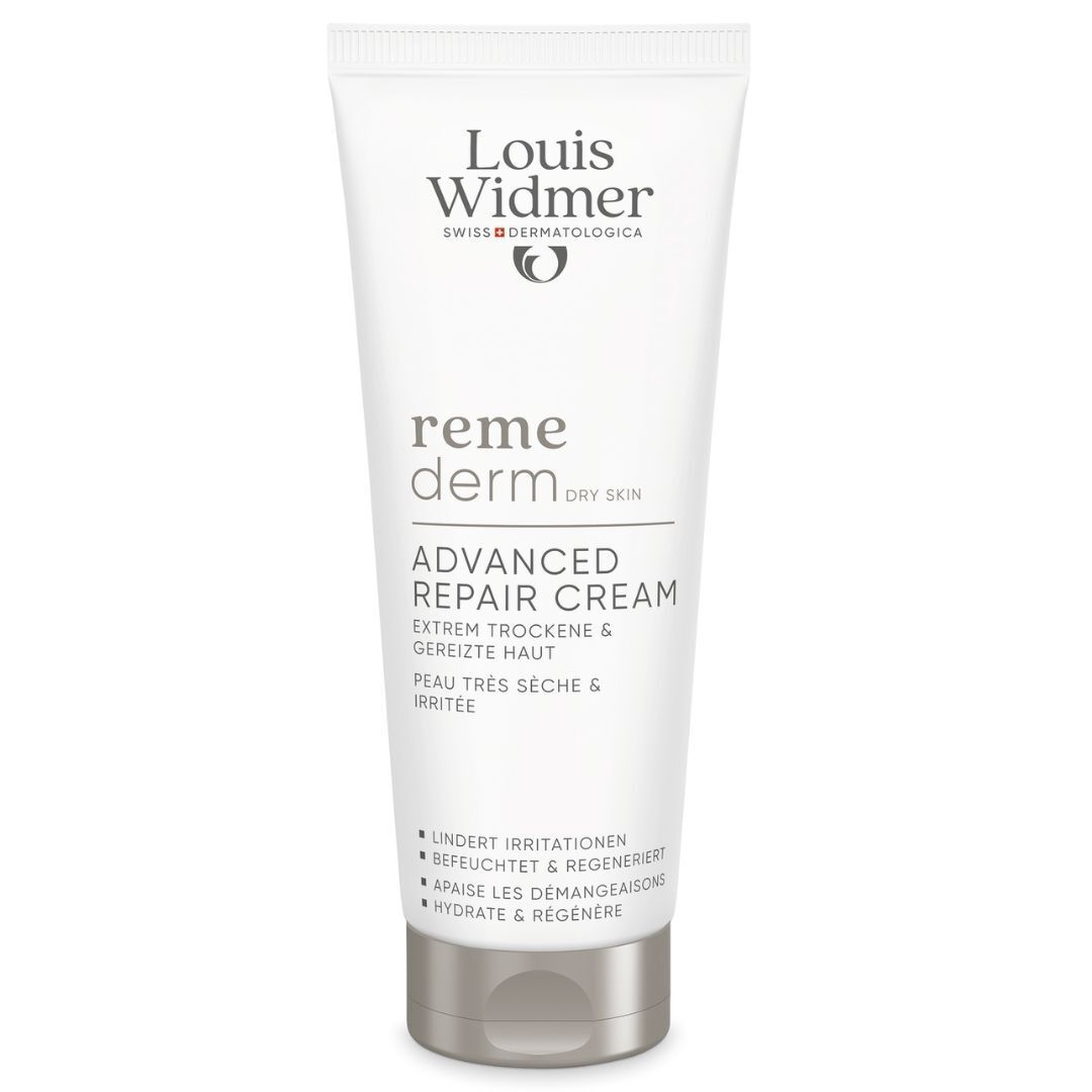 Crèmetube met Louis Widmer-logo en productnaam. Bevat « Advanced Repair Cream » voor de droge huid.