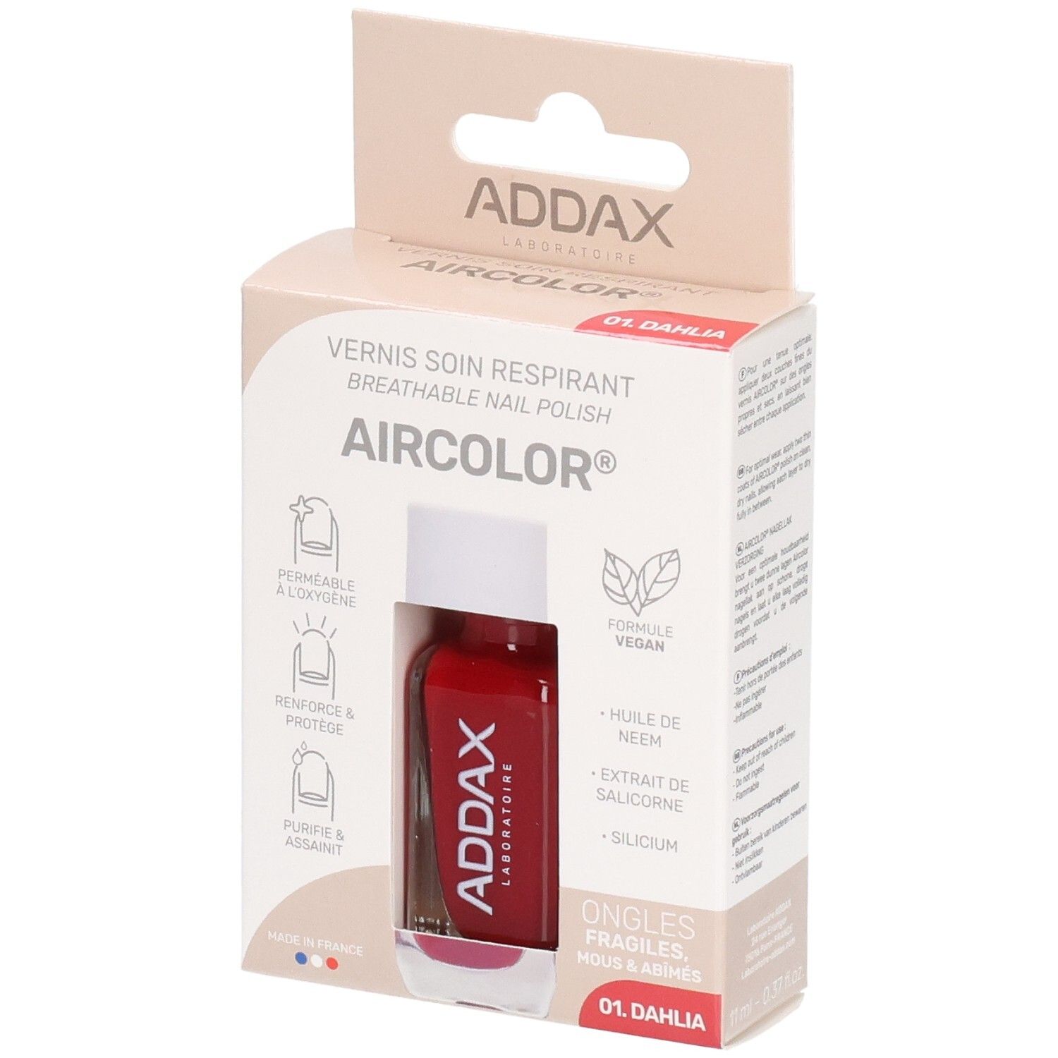 Flacon de vernis à ongles dans son emballage. Rouge, marque ADDAX. Informations produit sur l'emballage.