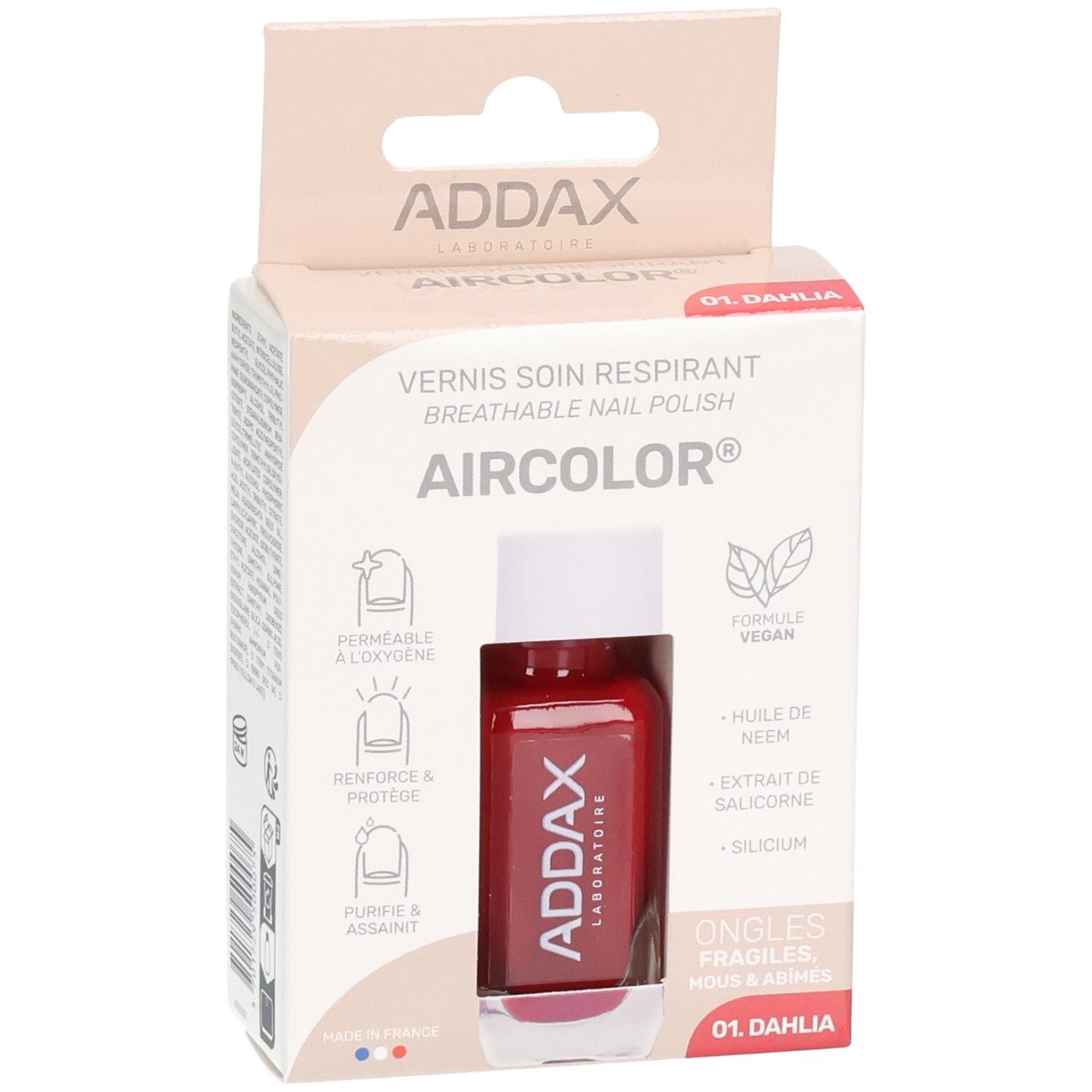 Flacon de vernis à ongles dans son emballage. Rouge, marque ADDAX. Informations produit sur l'emballage.