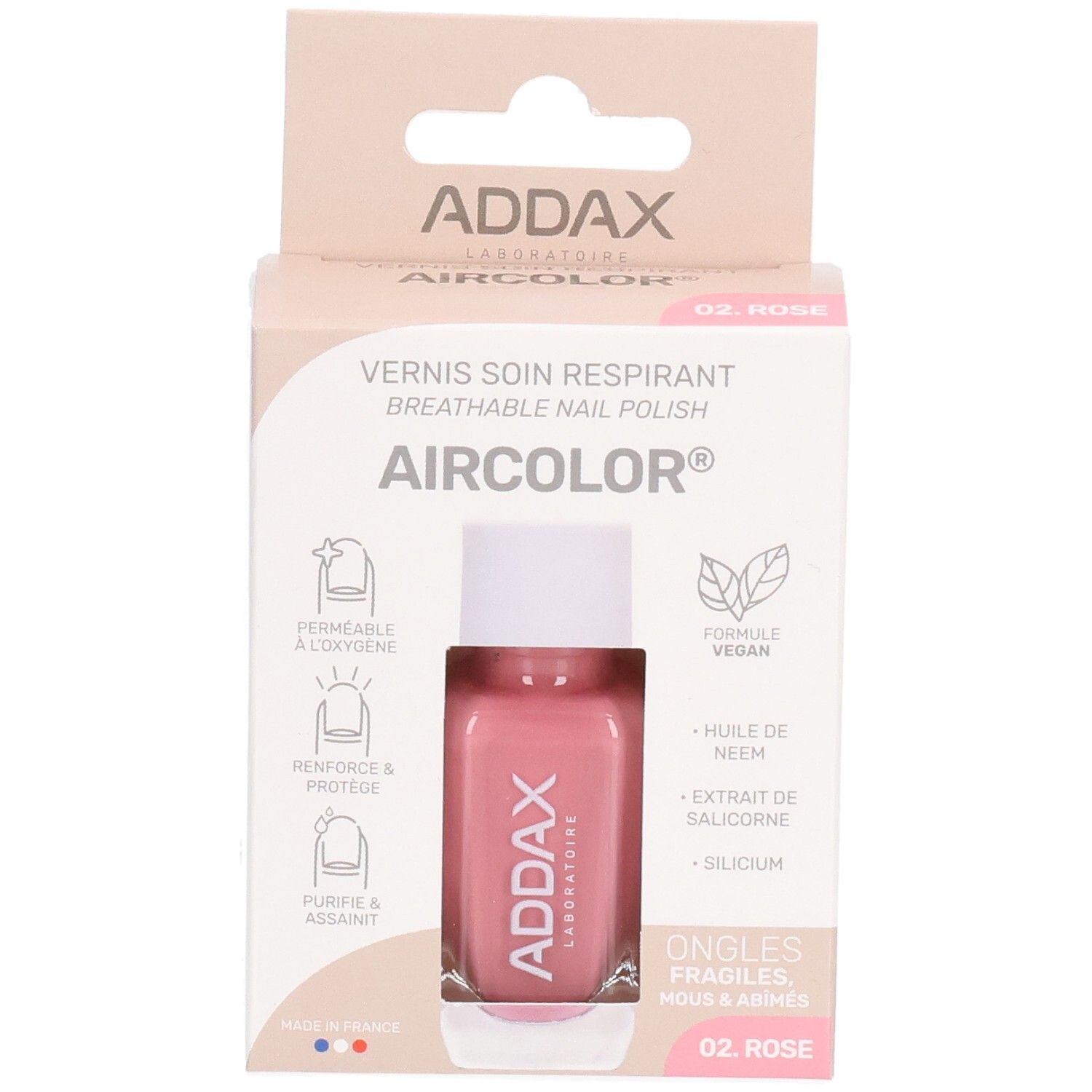 Roze nagellakfles in verpakking. Merk ADDAX, Aircolor. Opschrift: Vernis soin respirant, 02 Rose. Vegan.