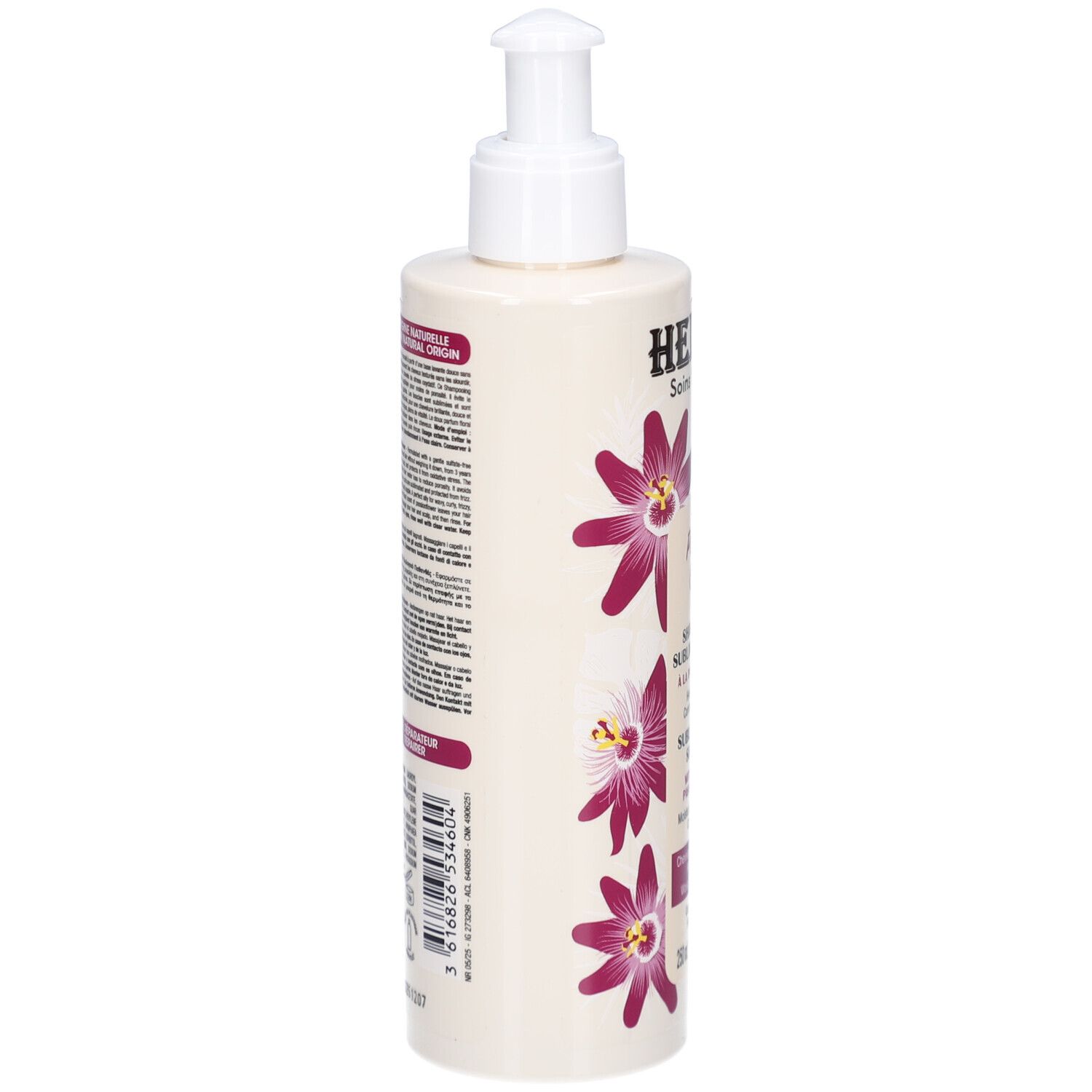 Flacon de shampooing, vue latérale. Inscription: Hei Poa. Décoré de fleurs violettes. Texte au dos.