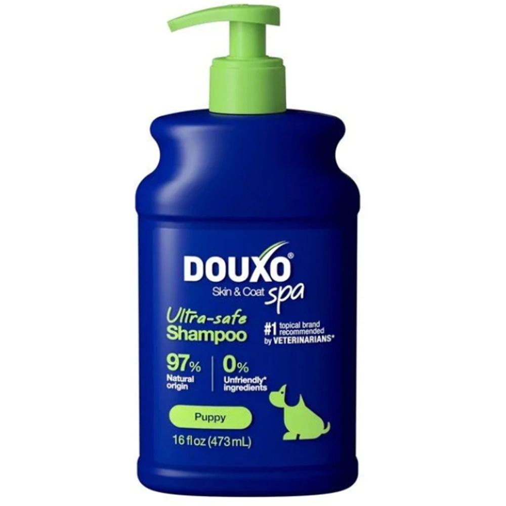 Douxo Spa puppy shampoo in blauwe fles met pompdosering.