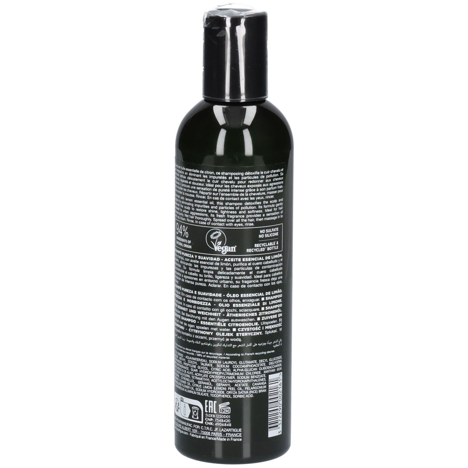 Achterkant van een donkere fles met gedetailleerde informatie en vegan zegel, Lazartigue Shampoo.