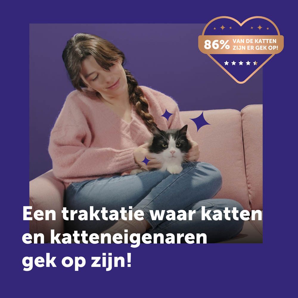 Kat krijgt Happy Snack by Feliway. Productverpakking en kat afgebeeld.