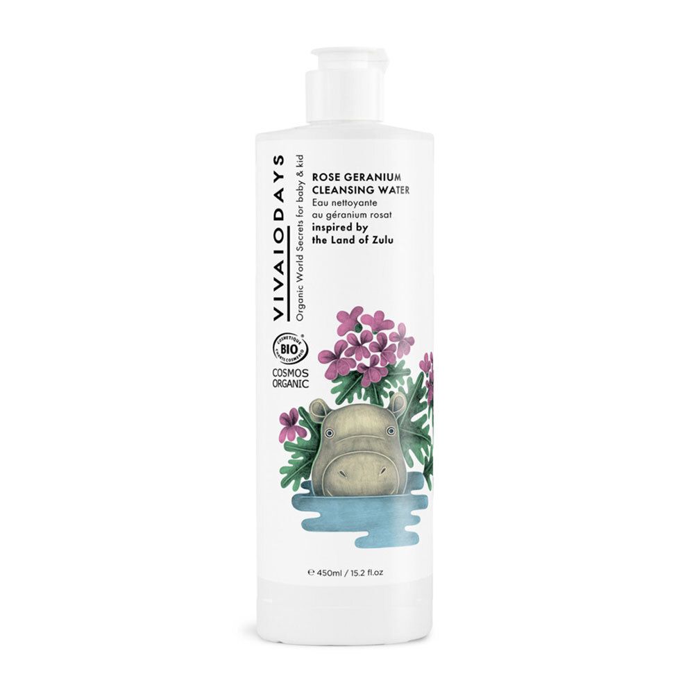 Witte fles met pomp. Opschrift: VIVAIODAYS, Rose Geranium Cleansing Water. Bio-certificering en nijlpaard-illustratie.