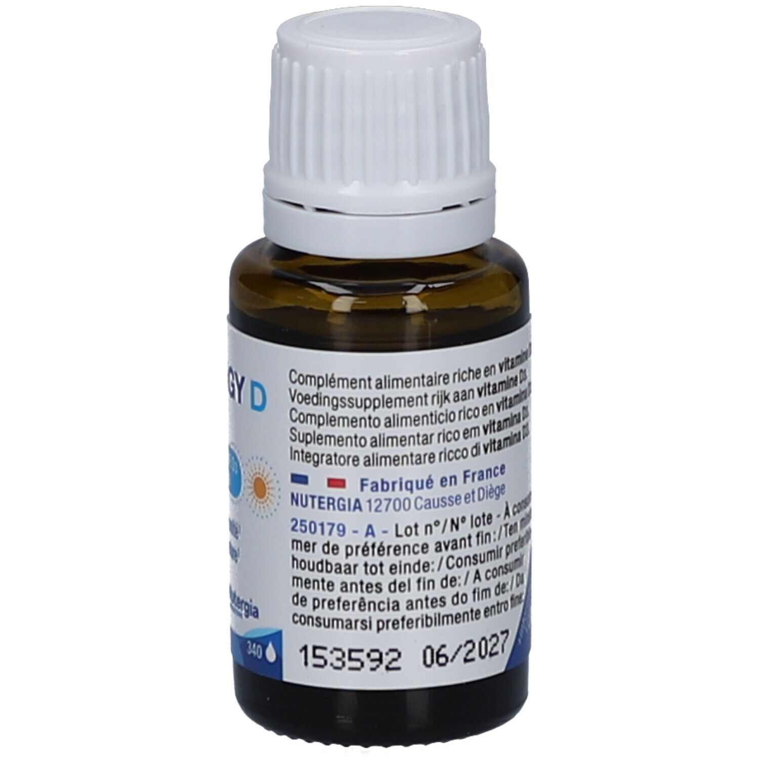 Flacon en verre brun avec bouchon blanc. Étiquettes bleues avec texte. Contient des informations sur le produit.