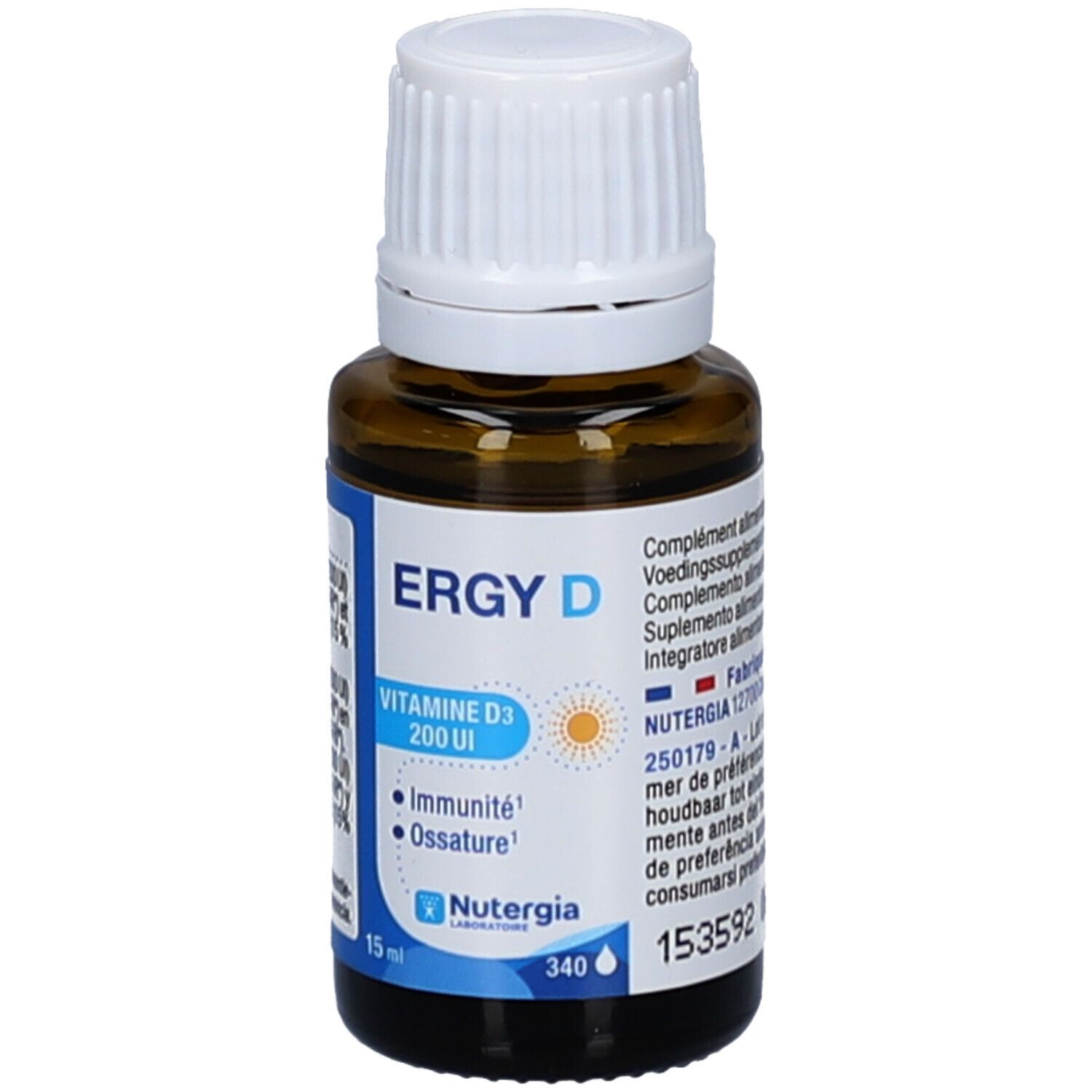 Flacon en verre brun avec bouchon blanc. Étiquettes bleues avec texte. Contient des informations sur le produit.