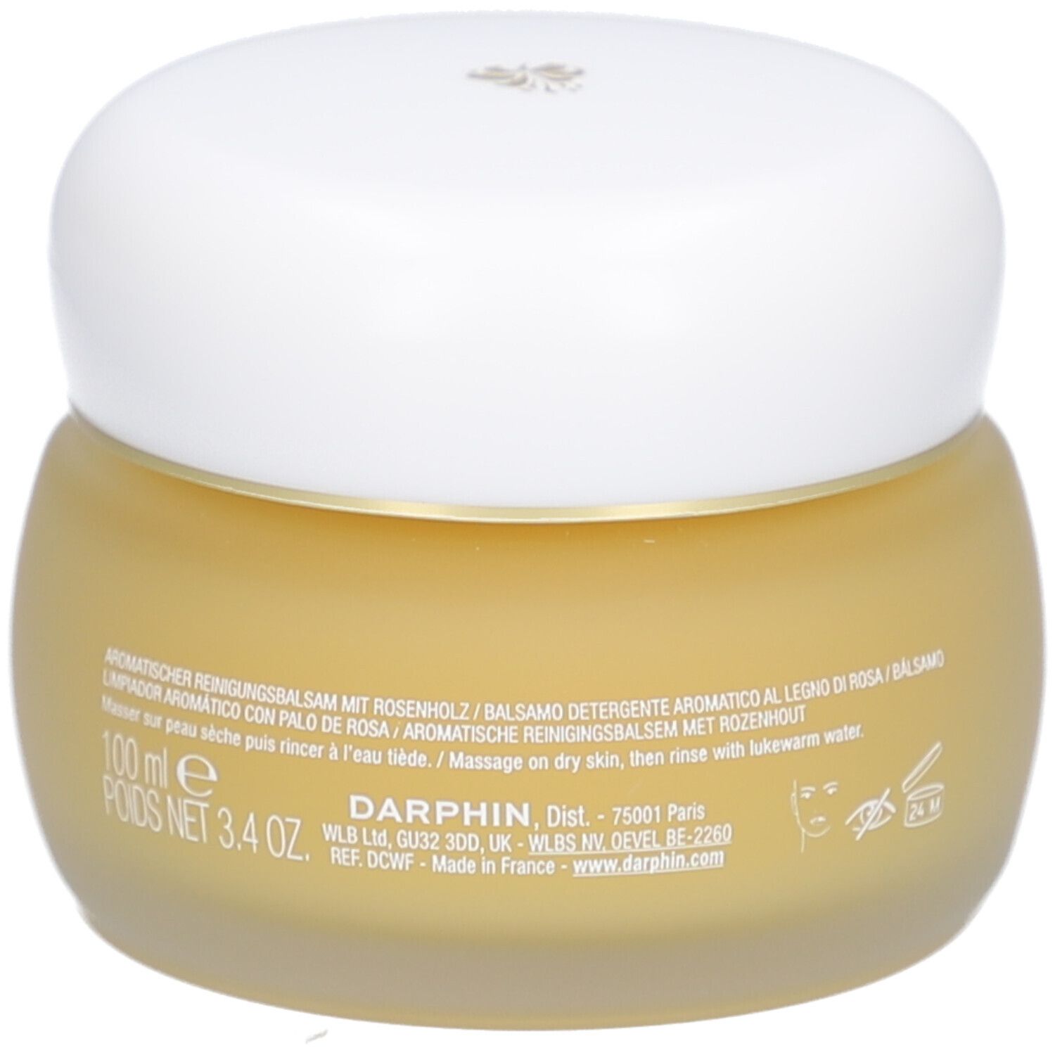 Pot rond en verre avec crème jaunâtre et couvercle blanc. Texte: Darphin, Eclat Sublime, 100 ml.