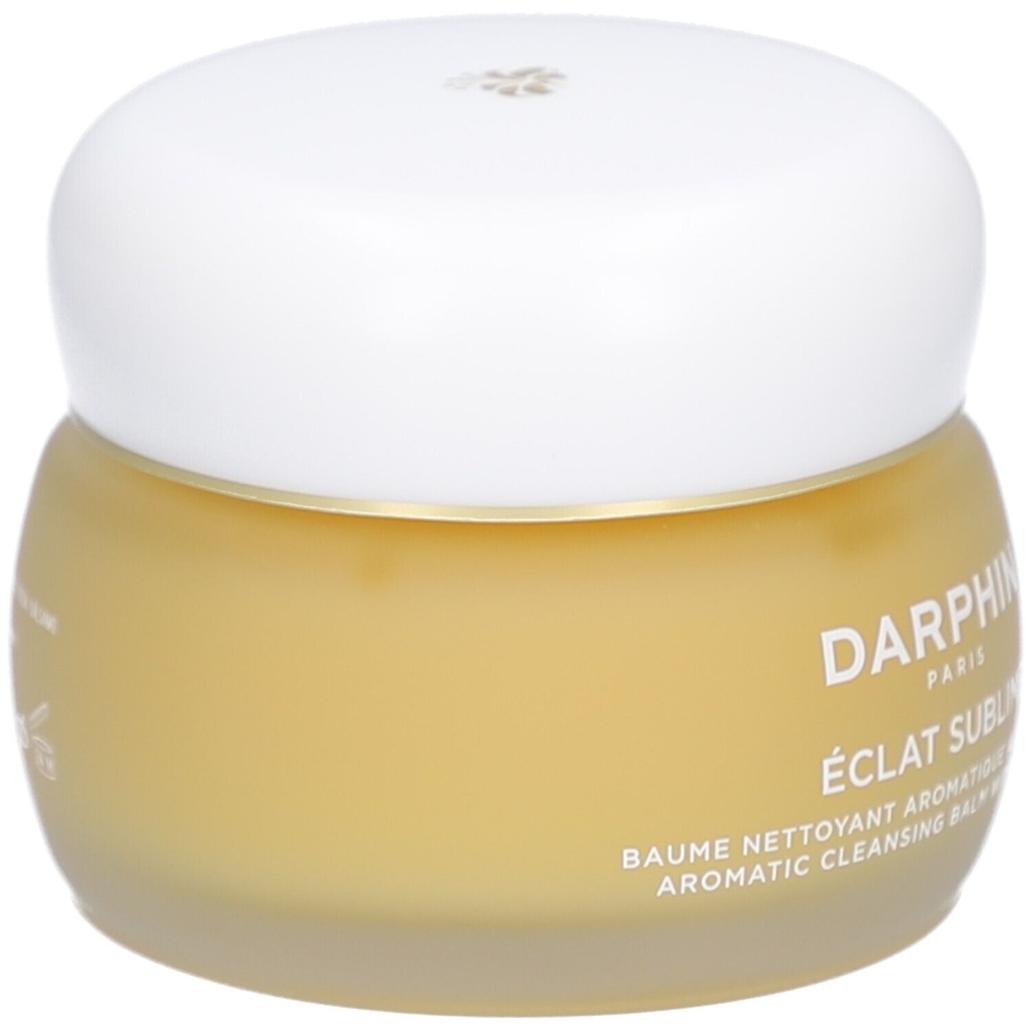 Pot rond en verre avec crème jaunâtre et couvercle blanc. Texte: Darphin, Eclat Sublime, Baume nettoyant.