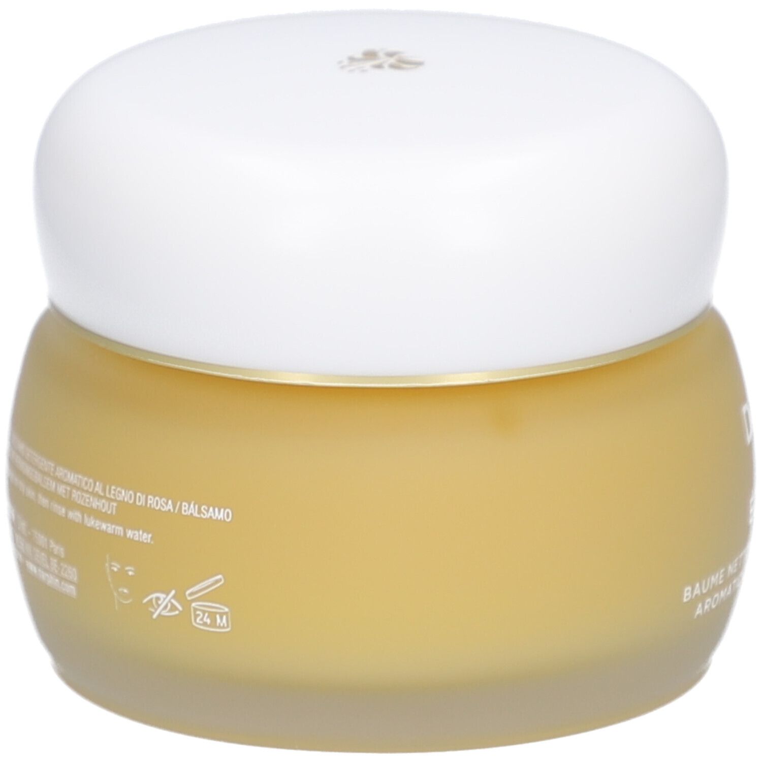 Pot rond en verre avec crème jaunâtre et couvercle blanc. Texte illisible.