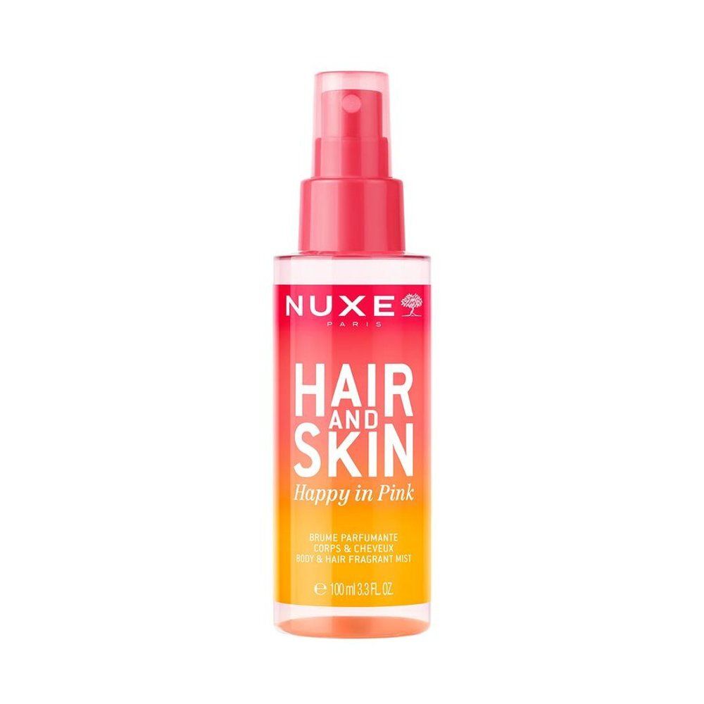 Roze-oranje fles Nuxe Hair and Skin Brume met verstuiver. Opschrift: Hair and Skin, Happy in Pink.