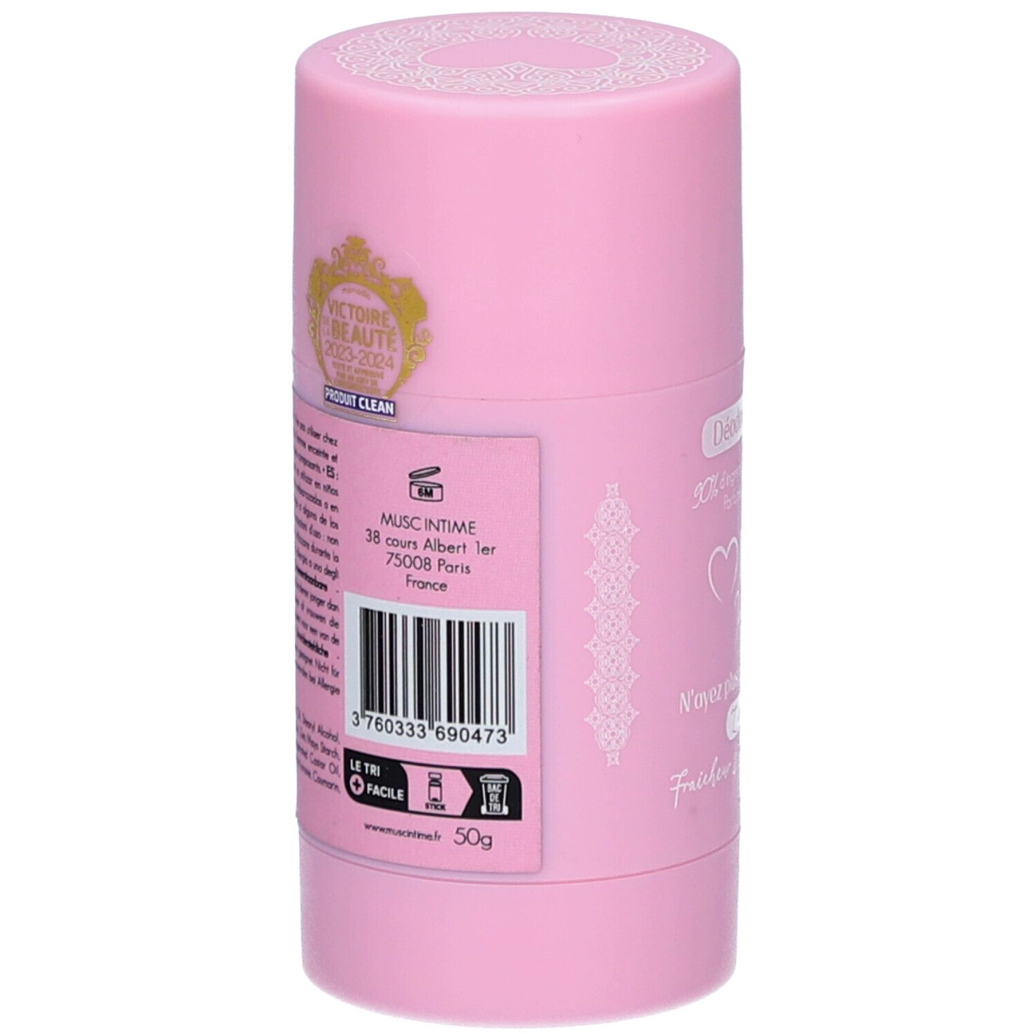 Roze deodorantstick. Opschrift: Musc Intime, adres, barcode, 50g. Gouden label.