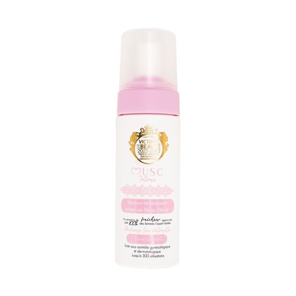 Flacon blanc et rose avec pompe. Inscription: Musc Intime, Mousse nettoyante intime au musc blanc. Logo.
