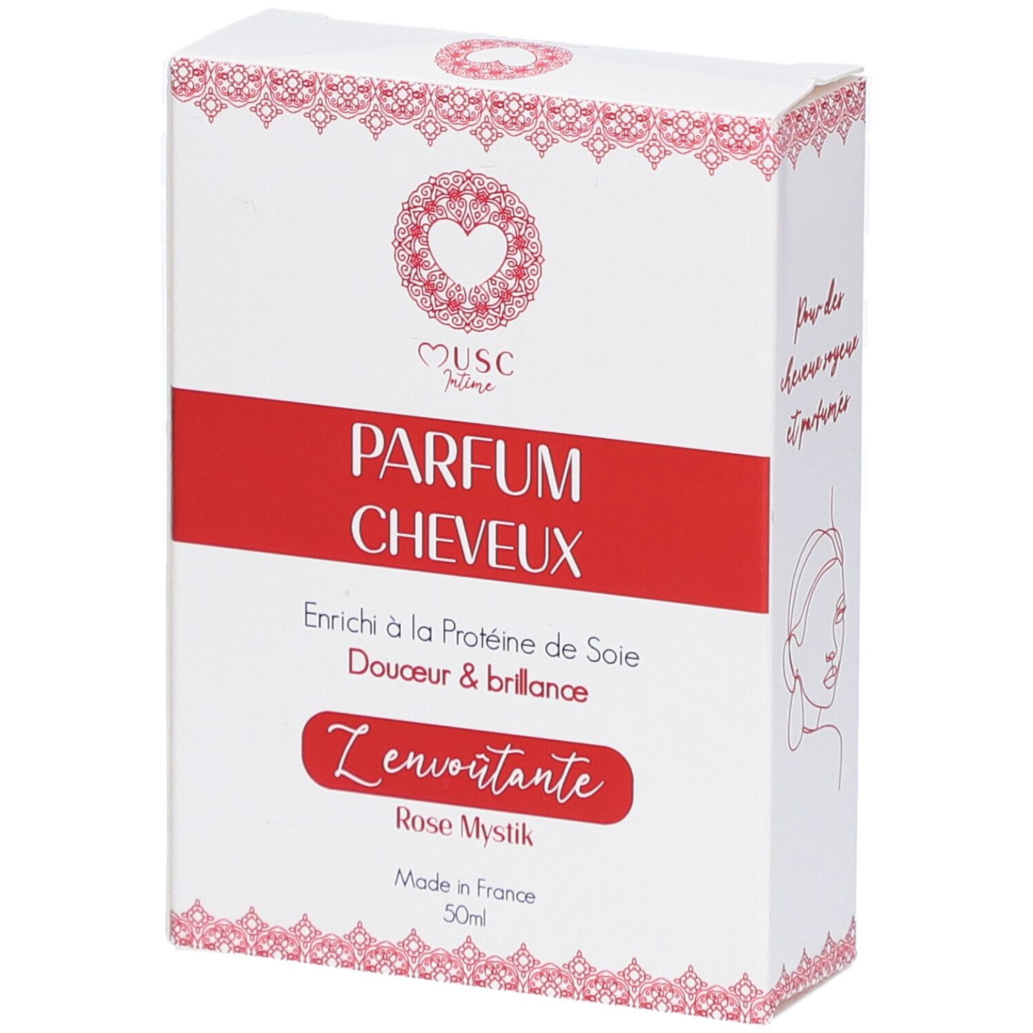 Witte doos met rode band. Opschrift: PARFUM CHEVEUX, Z'envoutante, Rose Mystik. Hart logo. Made in France.