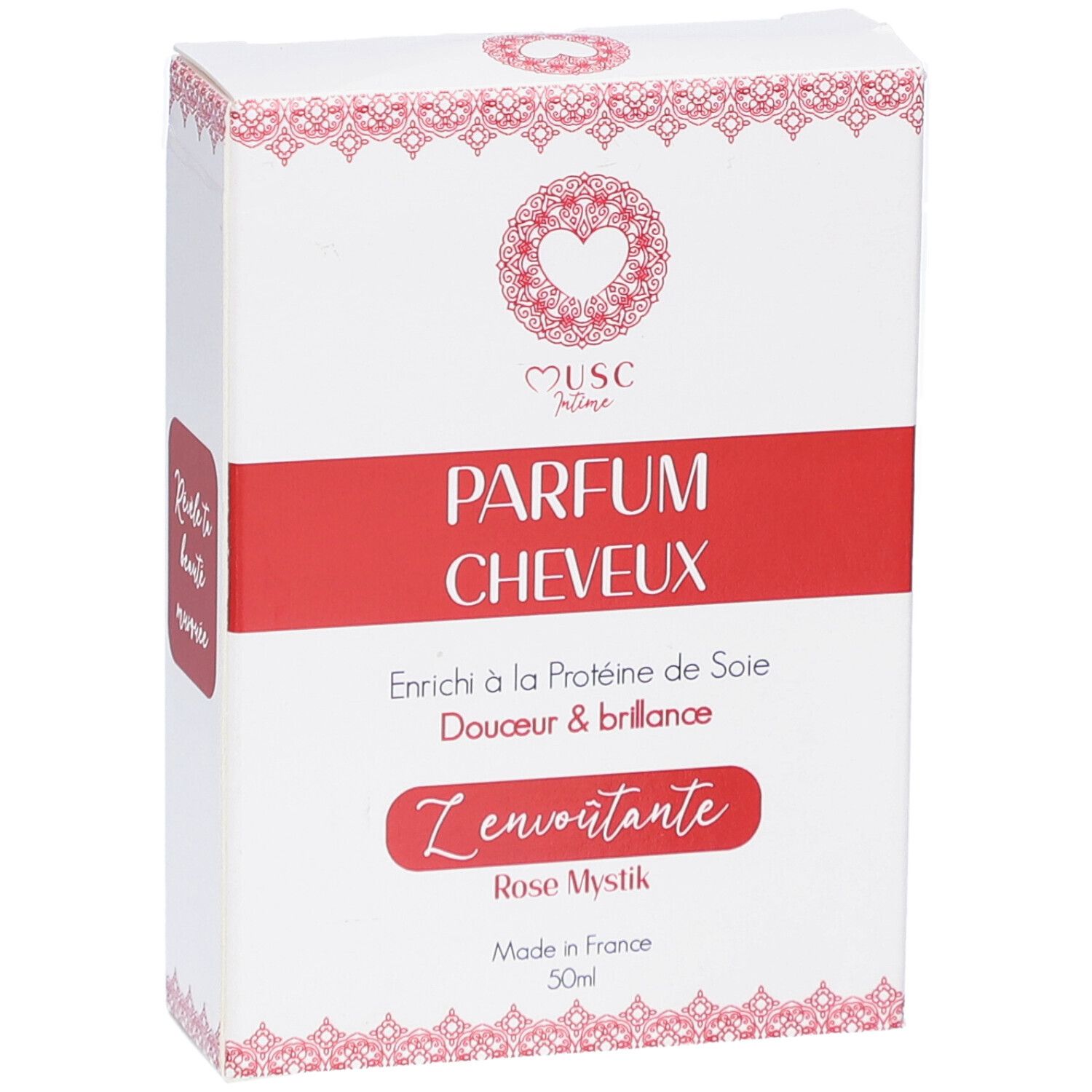 Witte doos met rode band. Opschrift: PARFUM CHEVEUX, Z'envoutante, Rose Mystik. Hart logo. Made in France.
