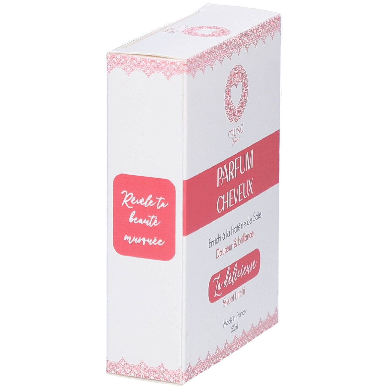 Witte doos met roze accenten. Tekst: "Musc Intime Parfum Cheveux". "La délicieuse Sweet Litchi". Gemaakt in Frankrijk. 50ml.