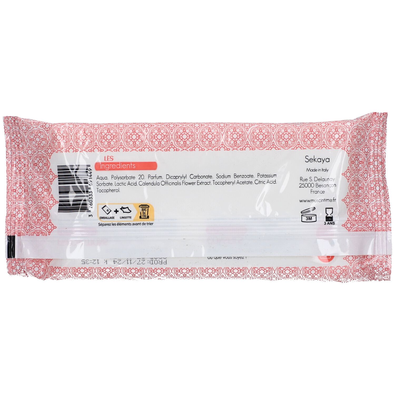 Achterkant van de verpakking met ingrediënten en fabrikantinfo. Roze-wit patroon.