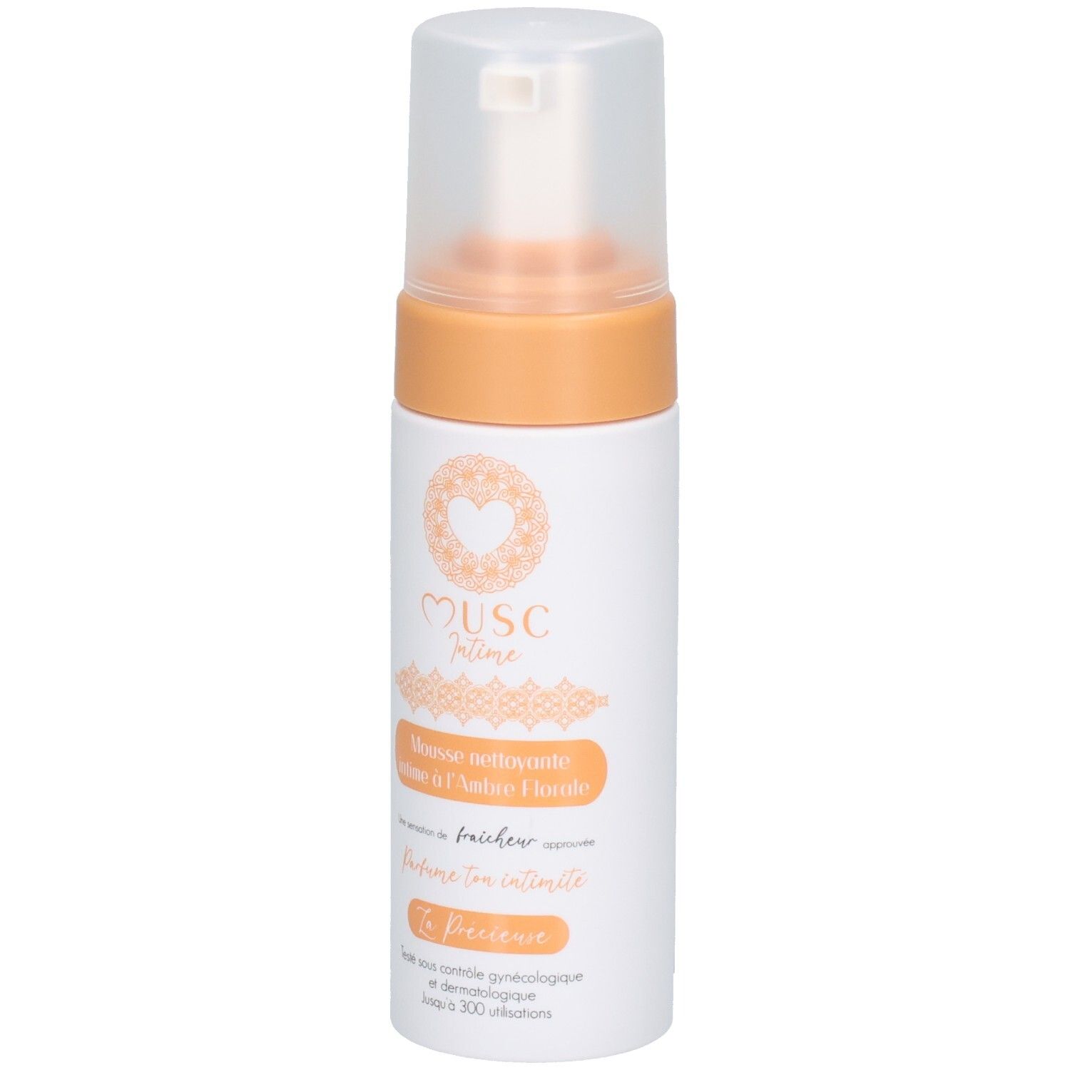 Witte en oranje fles met sproeikop. Opschrift: Musc Intime, Mousse nettoyante intime à l'Ambre Florale. Productnaam en logo.