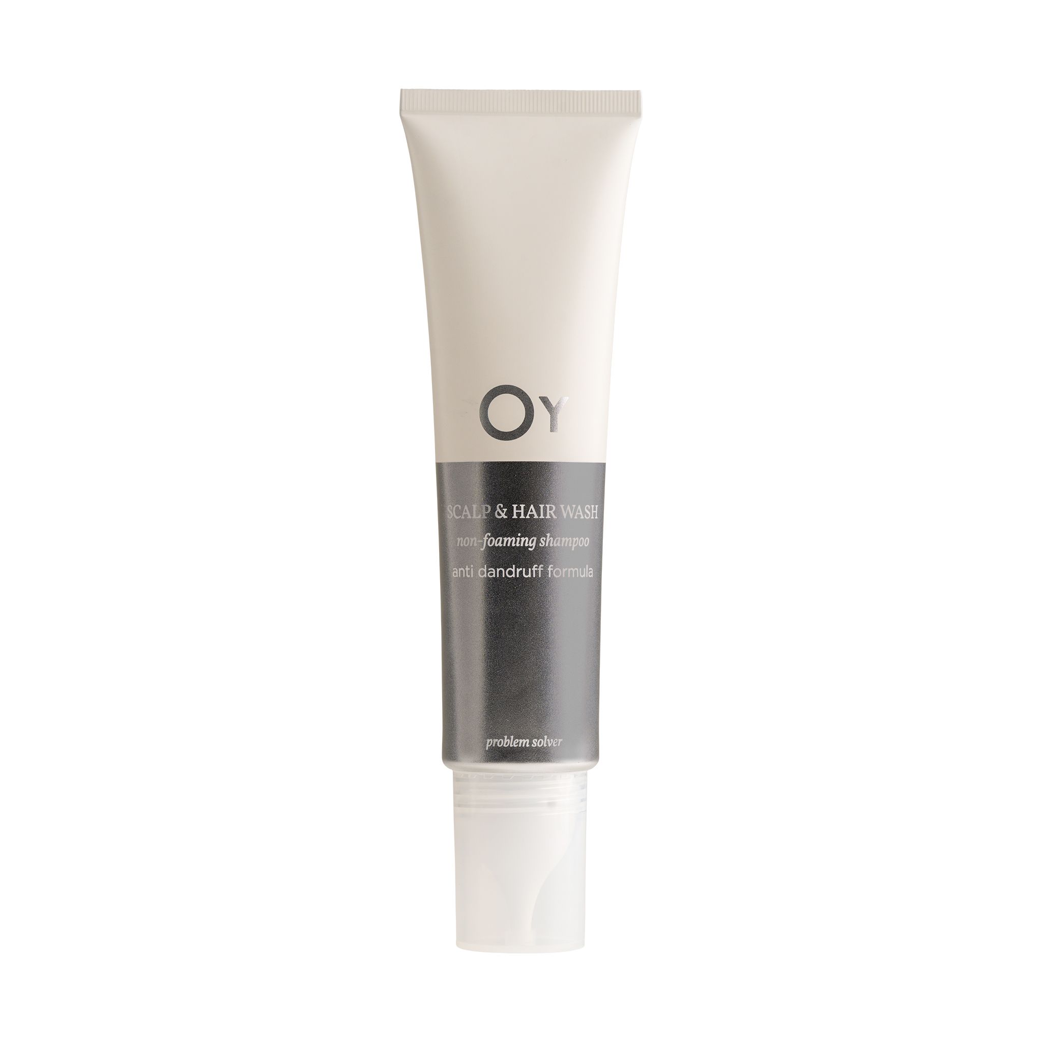 Tube avec logo Oy et nom du produit. Contient un shampooing antipelliculaire. Coloris gris et blanc.