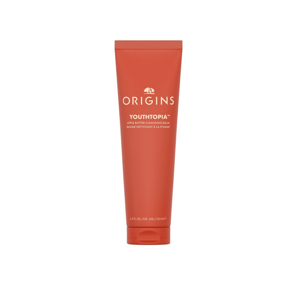 Rode tube met witte tekst: Origins Youthtopia Apple Butter Cleansing Balm. Logo bovenaan.