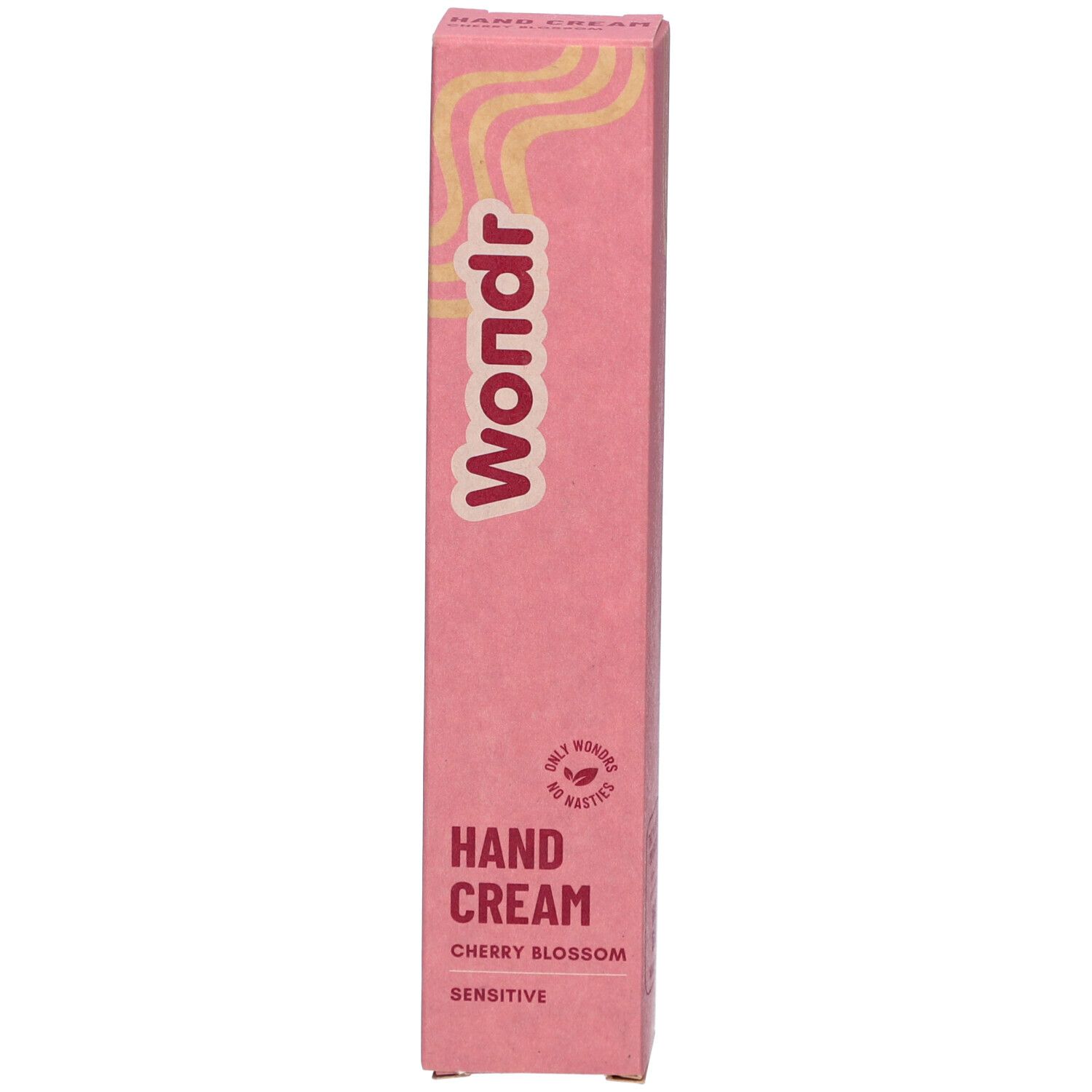 Boîte rose avec impression "Wondr", "Hand Cream Cherry Blossom" et "Sensitive". Motifs ondulés jaunes.