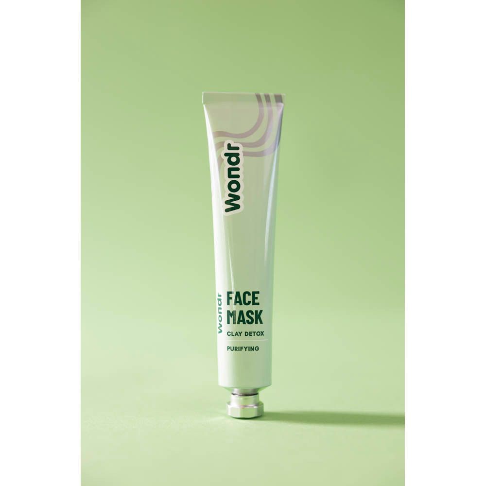 Masque facial en tube. Marque : Wondr. Texte : Face Mask Clay Detox Purifying. Tube vert clair avec bouchon argenté.