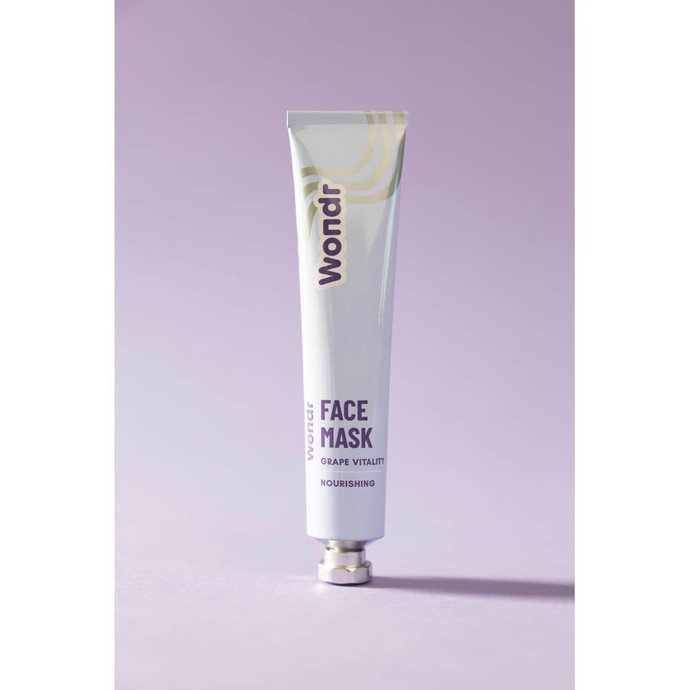 Witte tube met paarse tekst Wondr, Face Mask, Grape Vitality en Nourishing. Metalen dop.