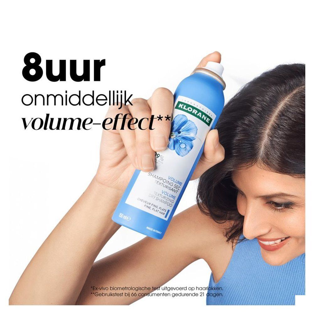 Achterkant van de blauwe spray. Afdrukken: gebruiksaanwijzing, waarschuwingssymbolen, QR-code, barcode en tekst.