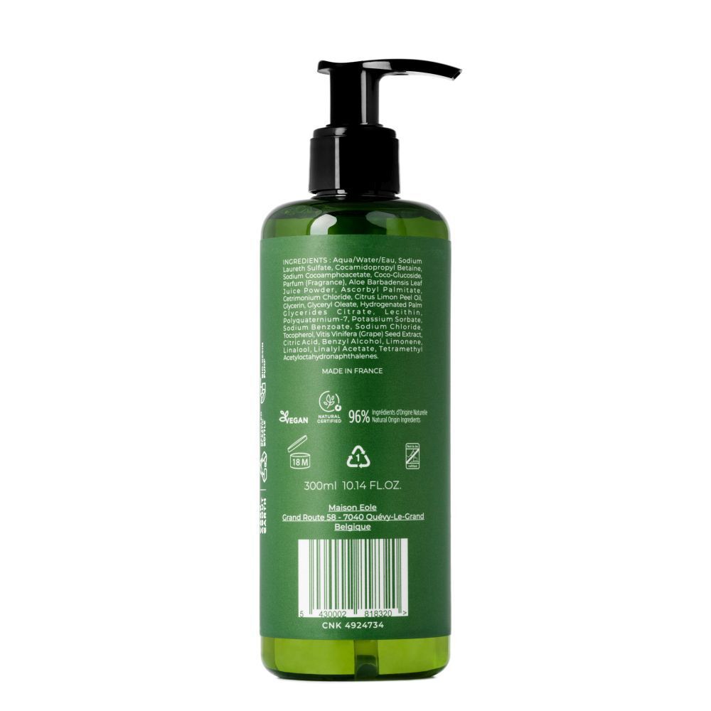Achterkant groene fles. Bevat ingrediënten, Vegan-logo, 300ml, 10.14 FL.OZ. en herkomst.