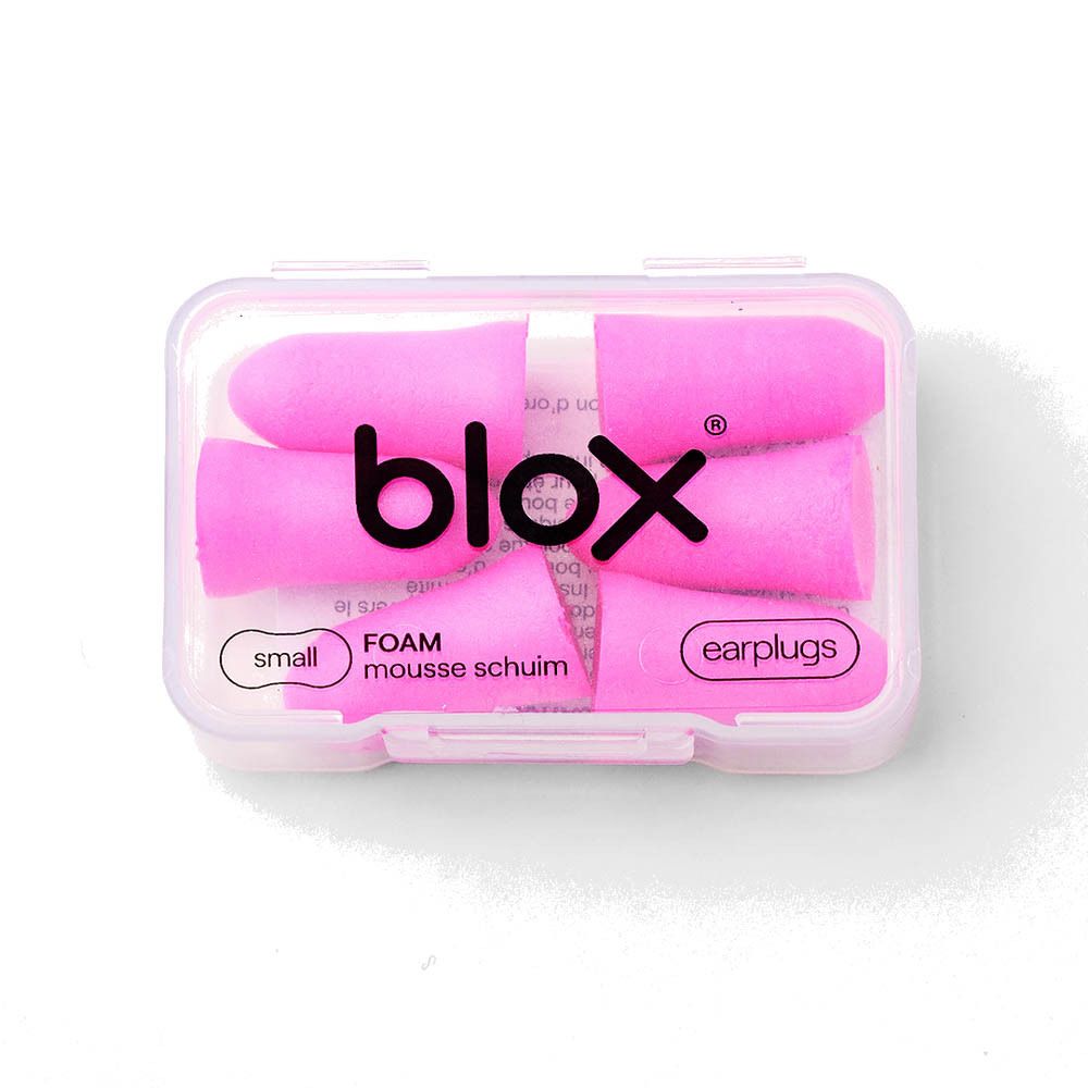 Kleine roze schuimoordopjes van Blox in een doorzichtig doosje.