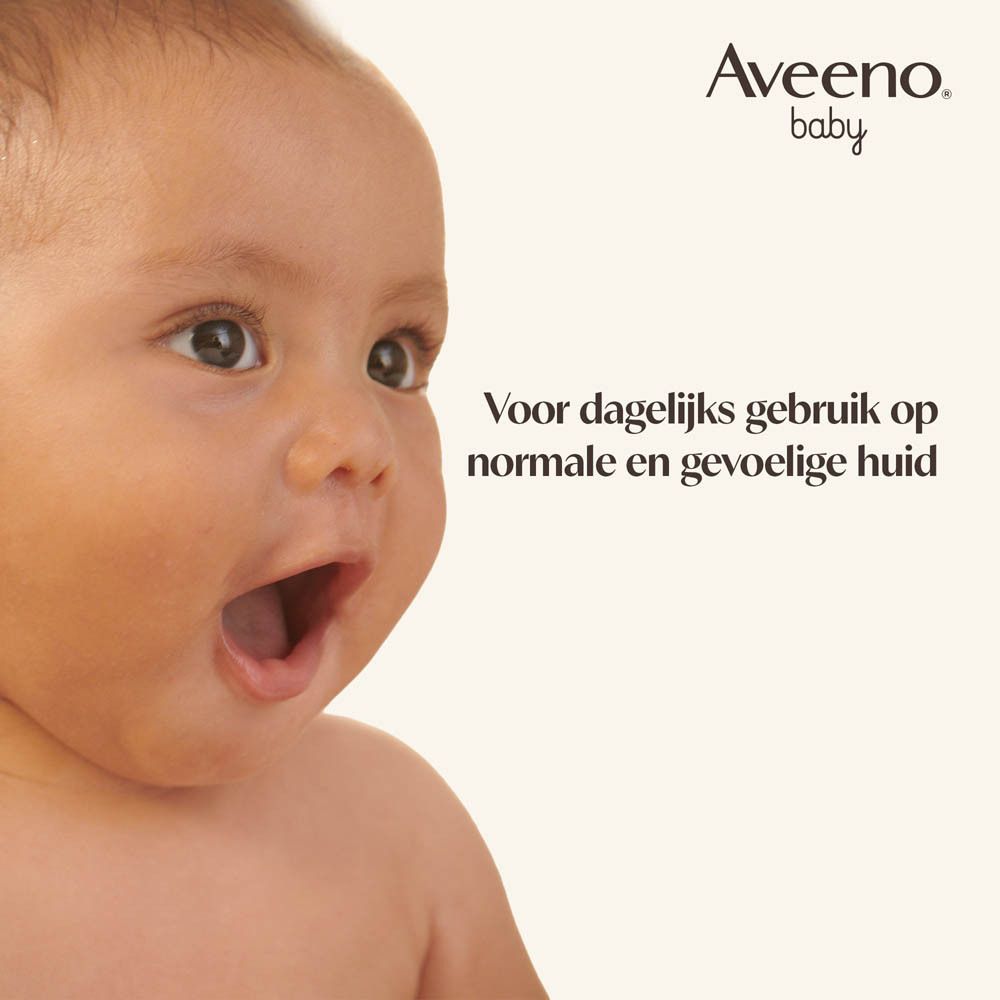 Baby met open mond. Tekst: Voor dagelijks gebruik op normale en gevoelige huid.