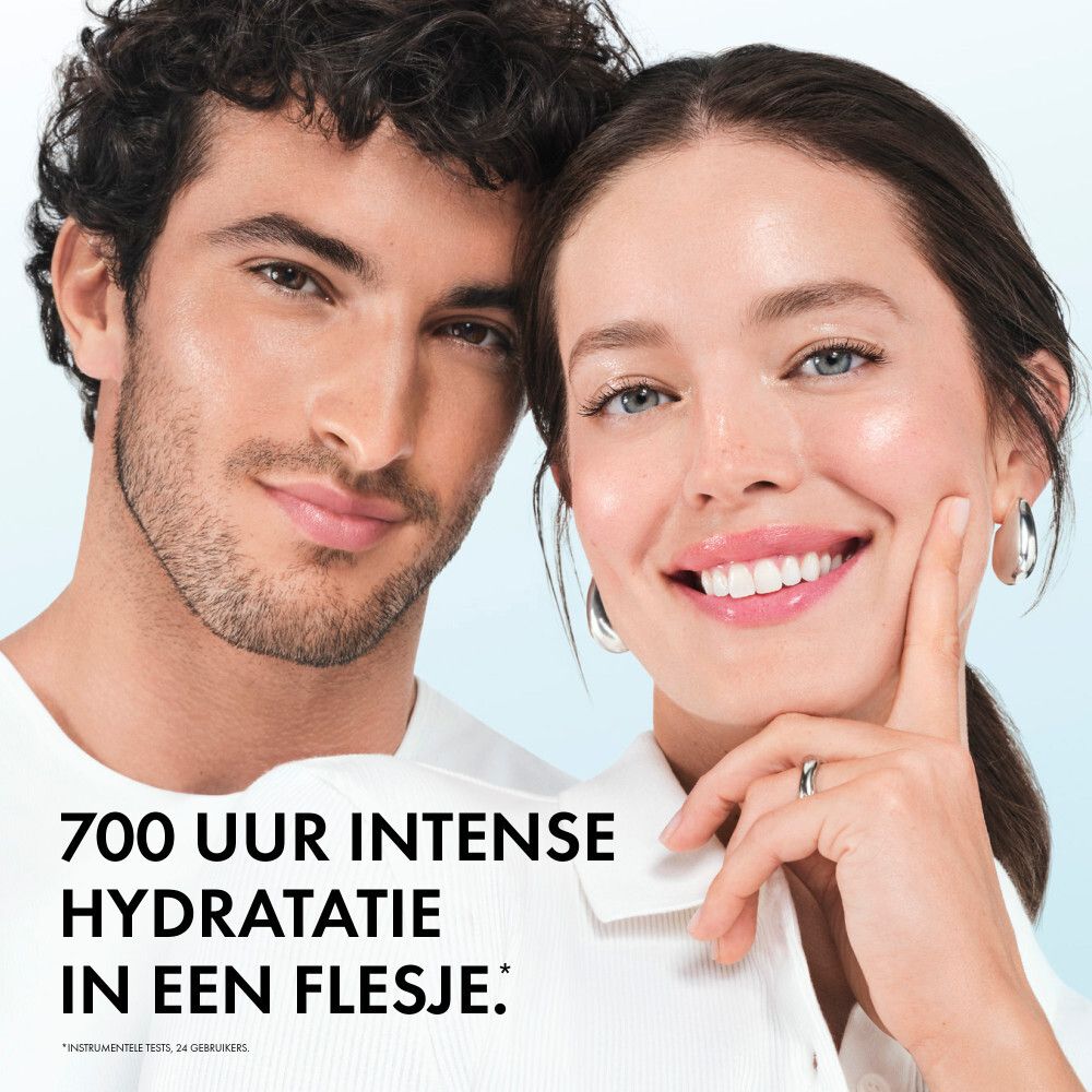 Serumfles. Blauw-transparante vloeistof. Zilveren dop en doseerpomp. Vichy Mineral 89.