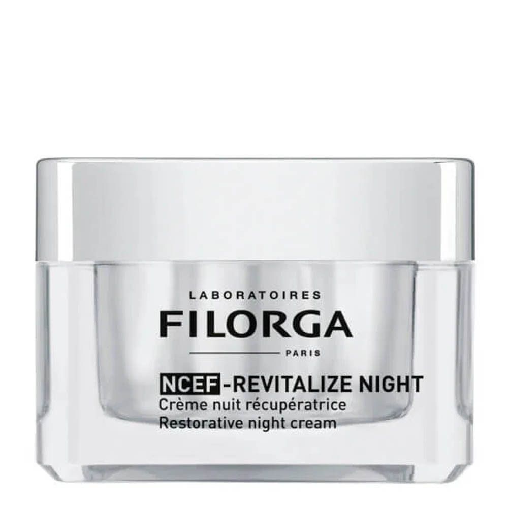 Transparante pot met zilveren deksel. Opschrift: LABORATOIRES FILORGA PARIS, NCEF-REVITALIZE NIGHT, Crème nuit récupératrice, Restorative night cream.