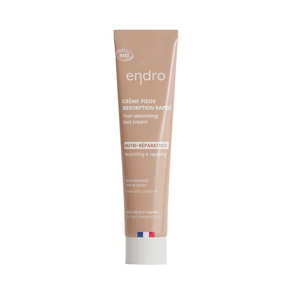 Beige tube met witte dop. Opschrift: Endro, Crème Pieds, Absorption Rapide, Nutri-Réparatrice. Bio-label.