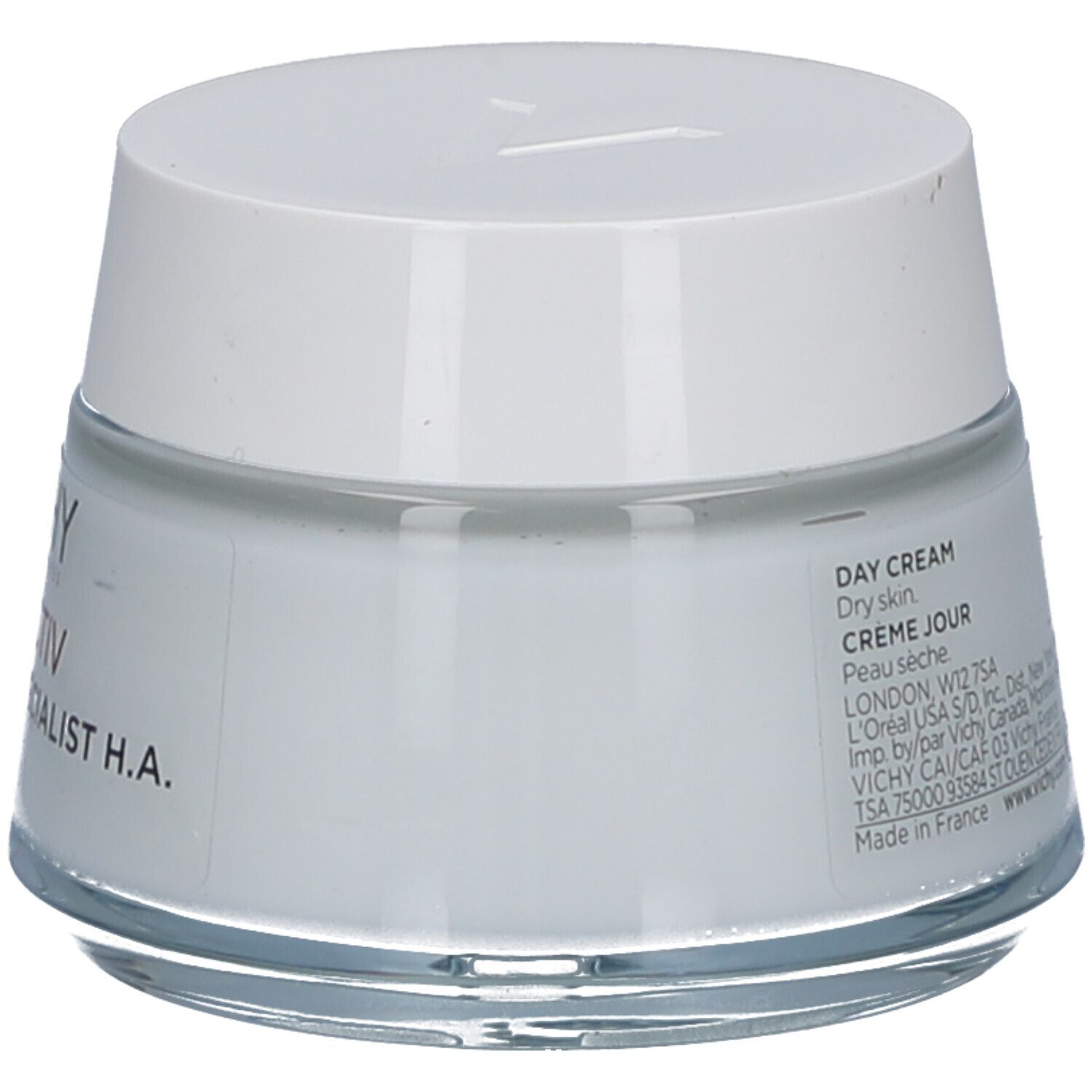 Crèmepot met witte deksel. Opschrift: Day Cream, Crème Jour. Achterkant met tekst.