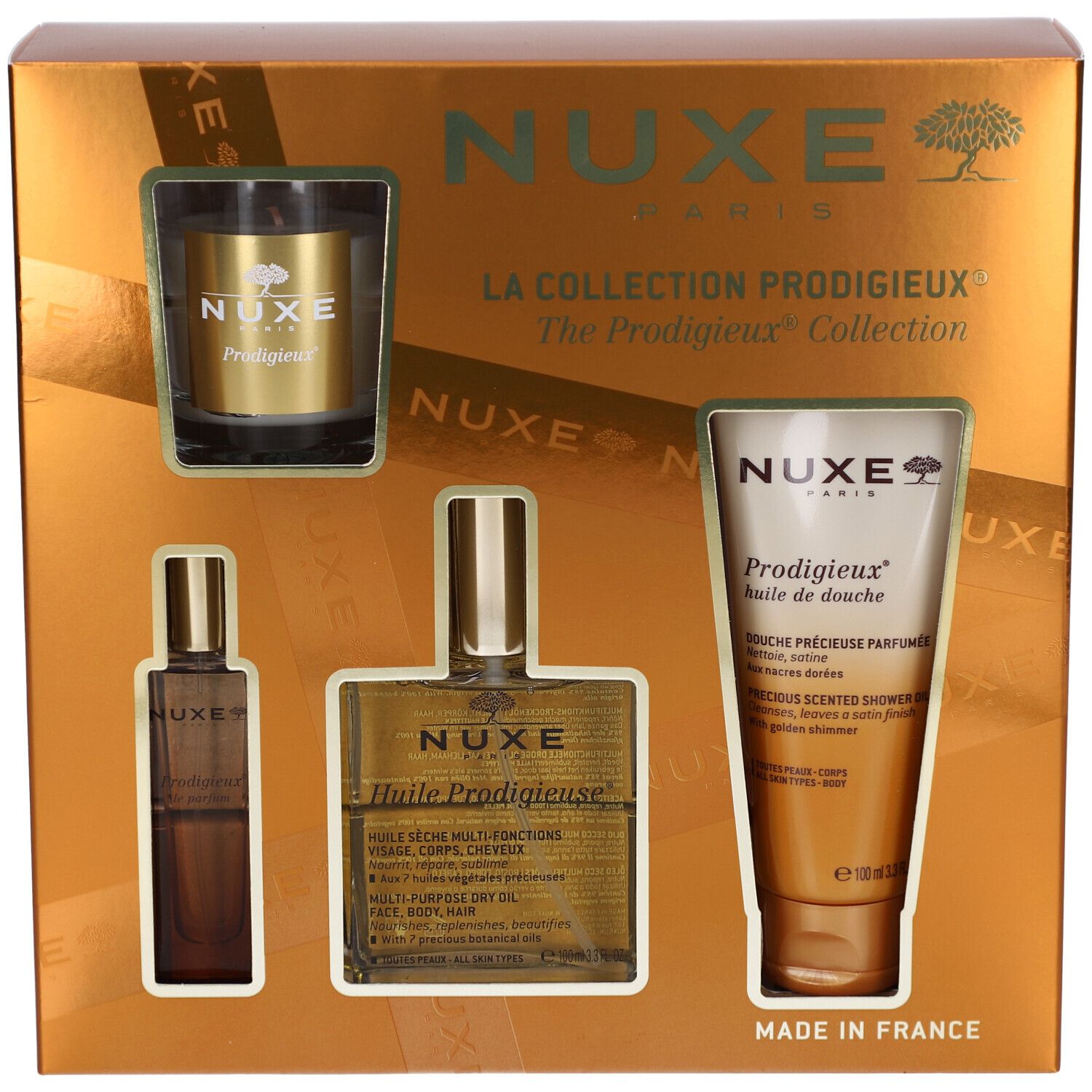 Coffret cadeau doré. Contient des flacons, une bougie et un tube. Marque Nuxe. Collection Prodigieux.