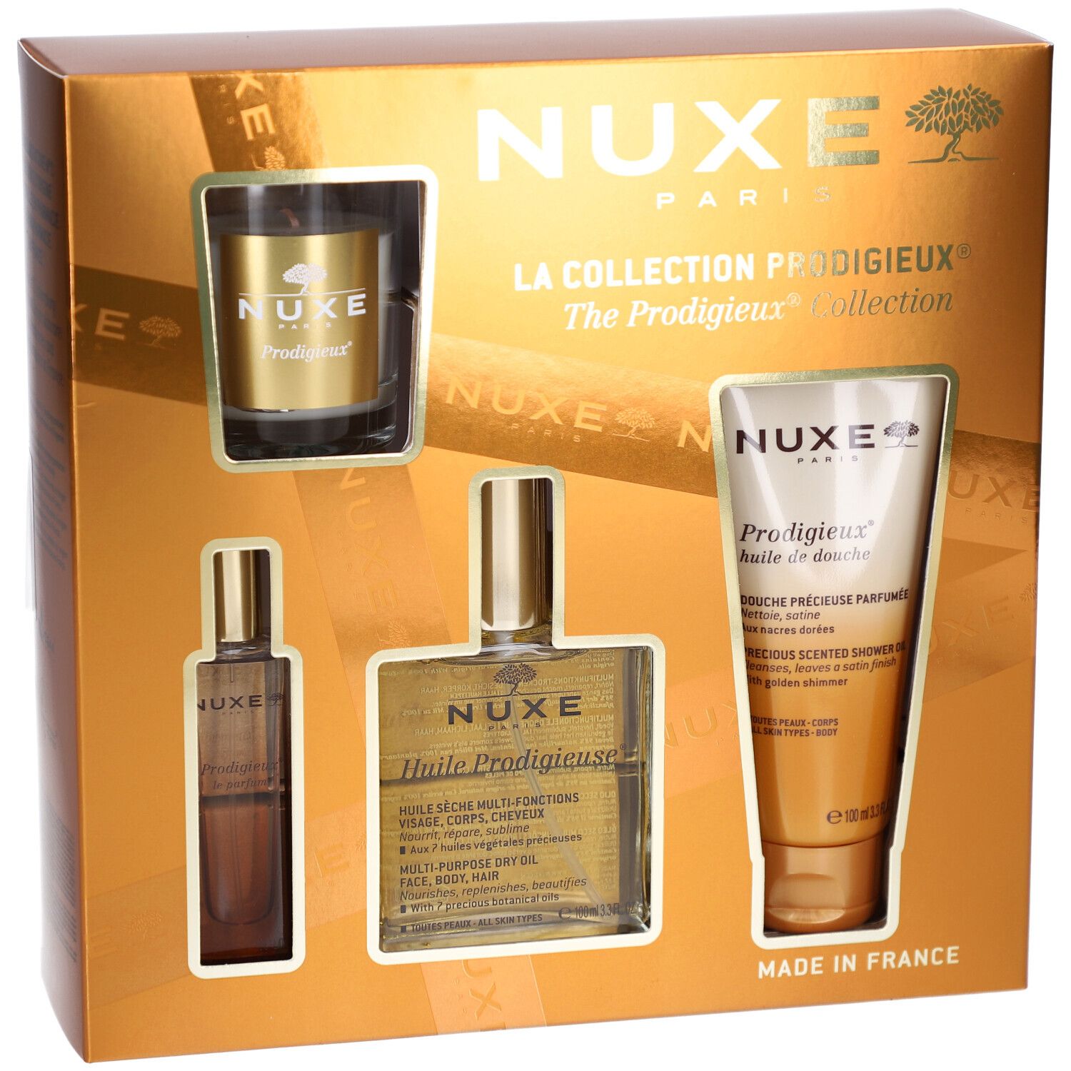 Coffret cadeau doré. Contient des flacons, une bougie et un tube. Marque Nuxe. Collection Prodigieux.