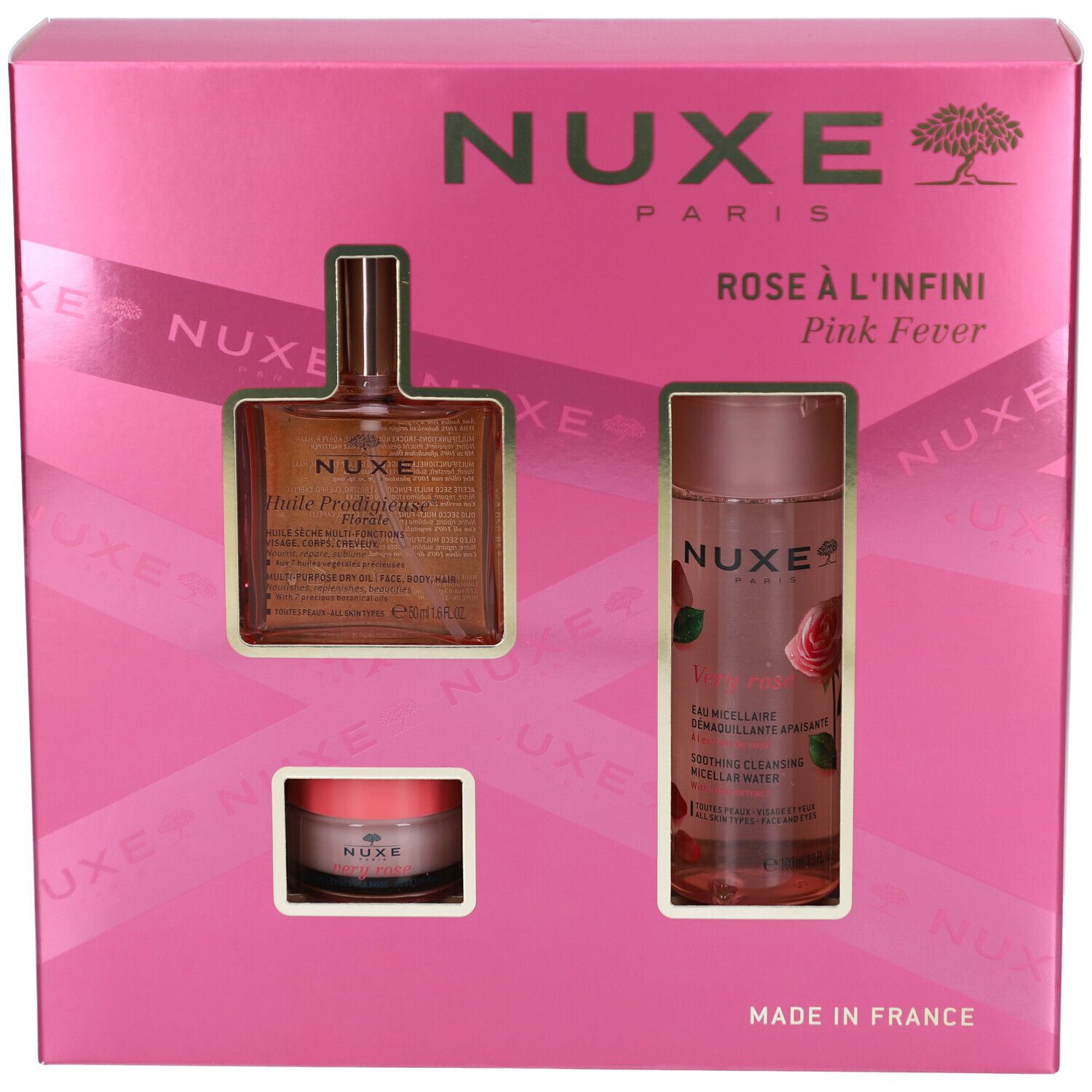 Coffret rose avec trois produits. Visible : logo Nuxe, noms de produits et les produits eux-mêmes.