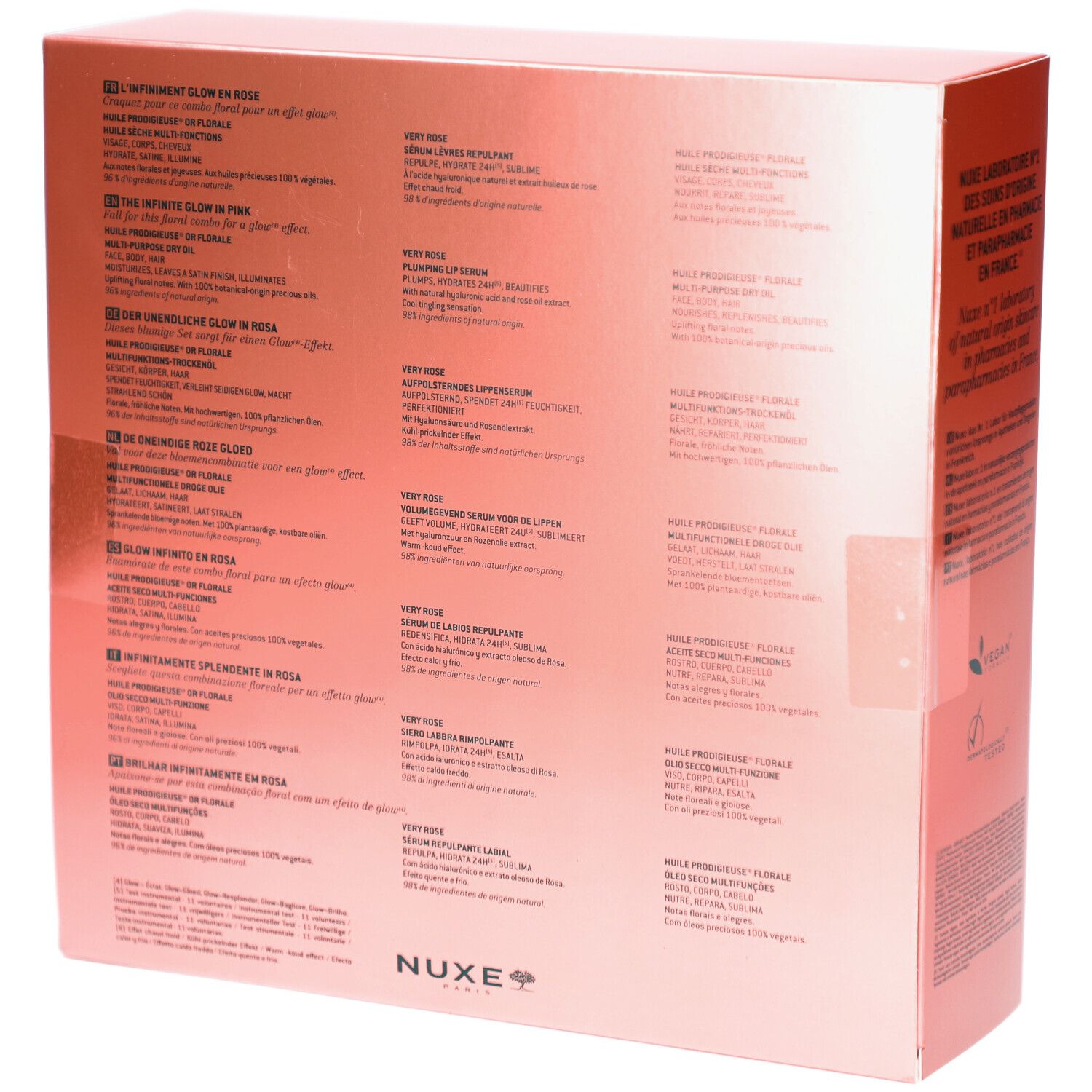 Dos du coffret cadeau rose. Texte multilingue. Logo: Nuxe Paris. Texte: L'Infiniement Glow en Rose, 100% végétal.