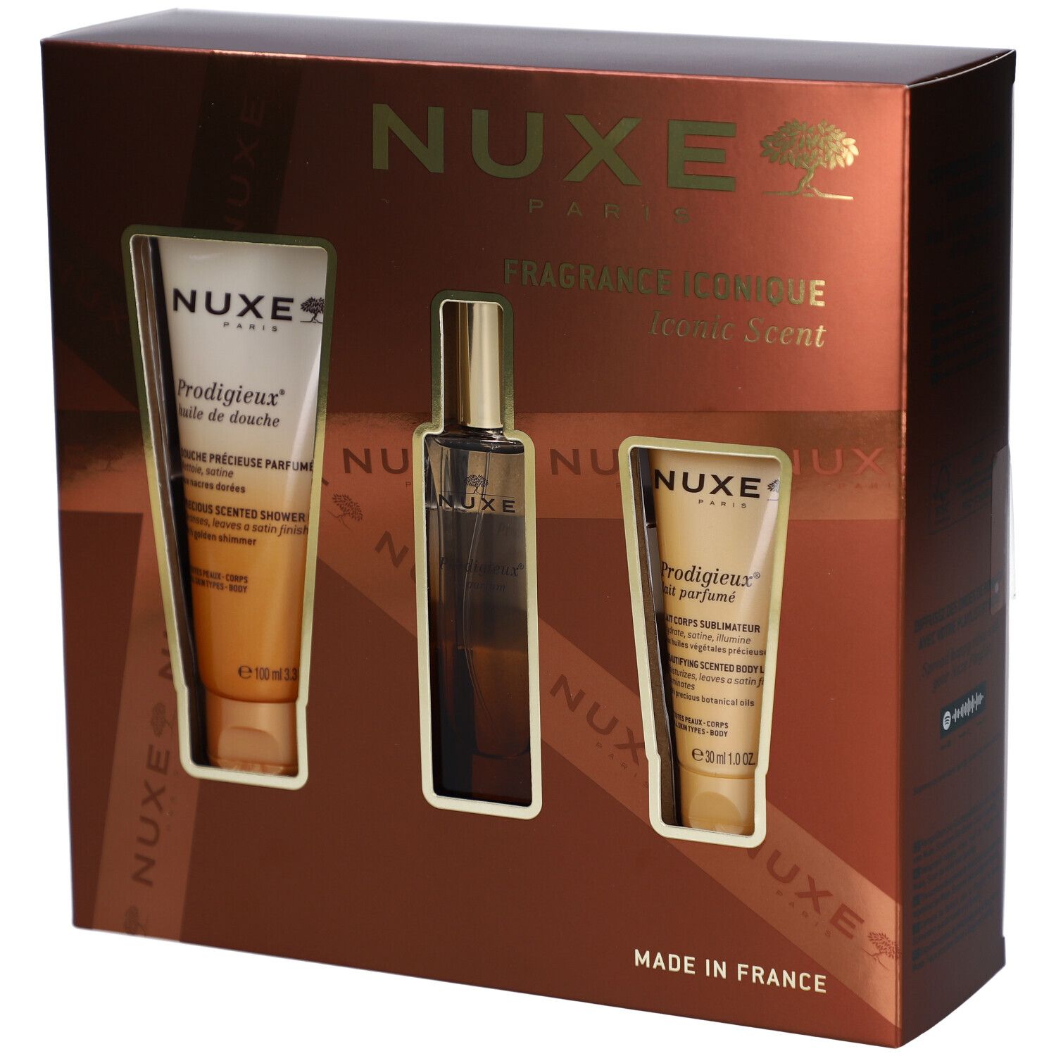 Cadeauset met drie producten. Bevat een douchecrème, parfum en bodylotion. Verpakking in een bruine doos met gouden accenten.